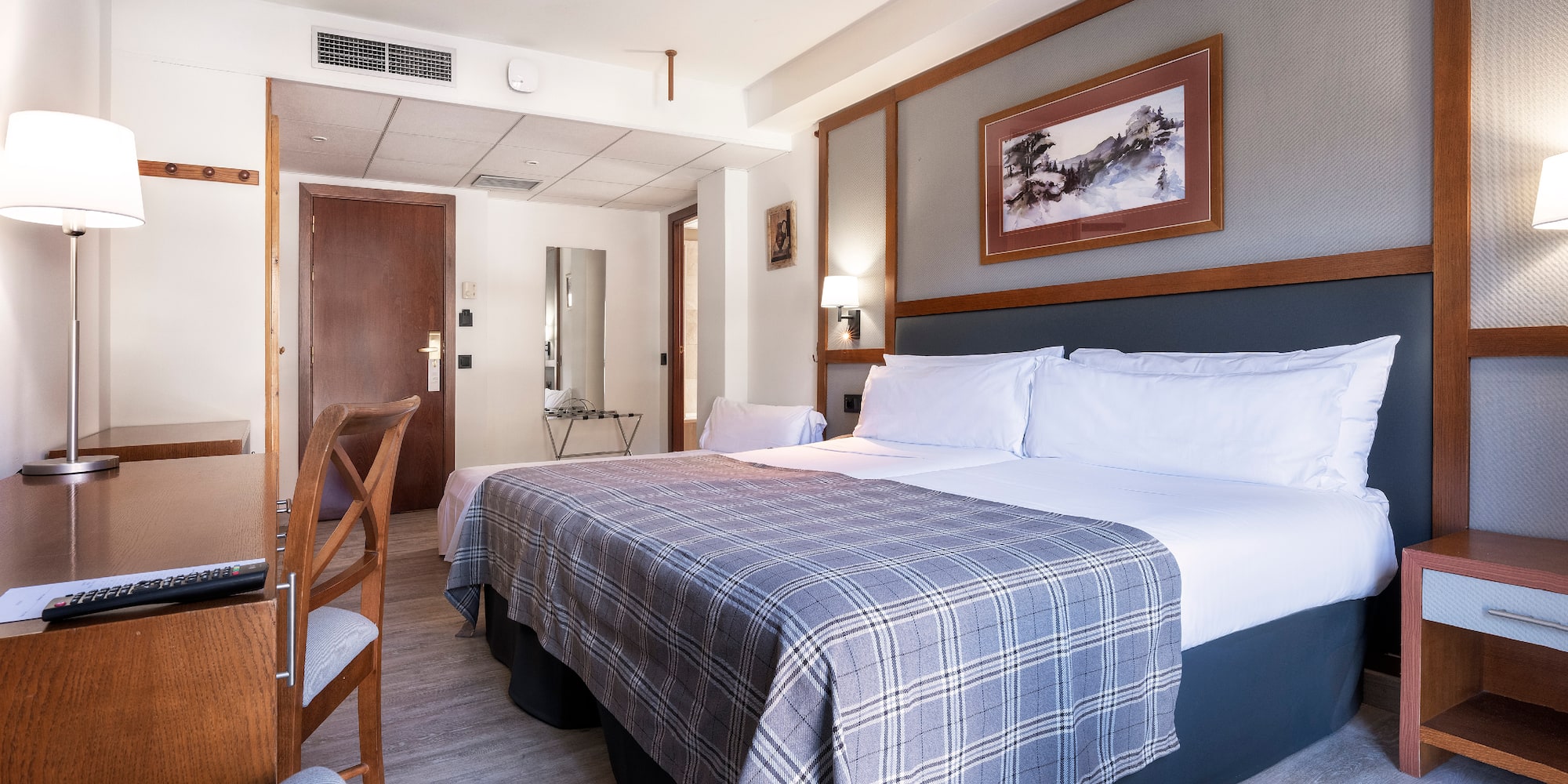 a bed in a hotel room