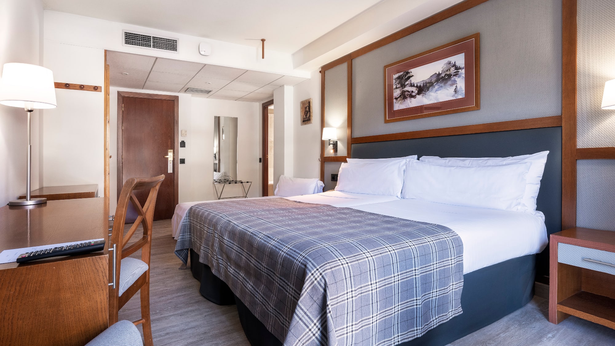 a bed in a hotel room