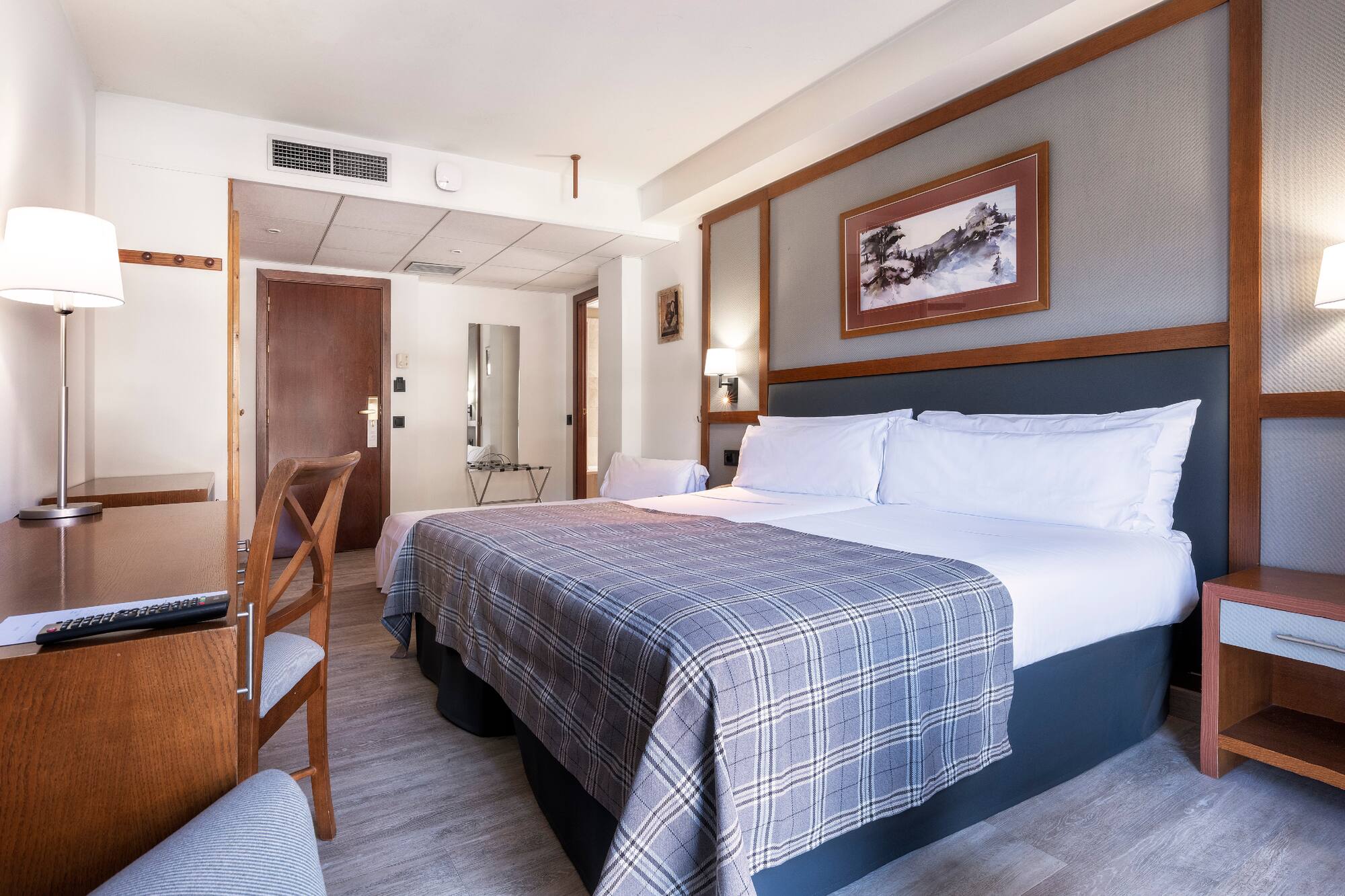 a bed in a hotel room