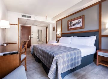 a bed in a hotel room