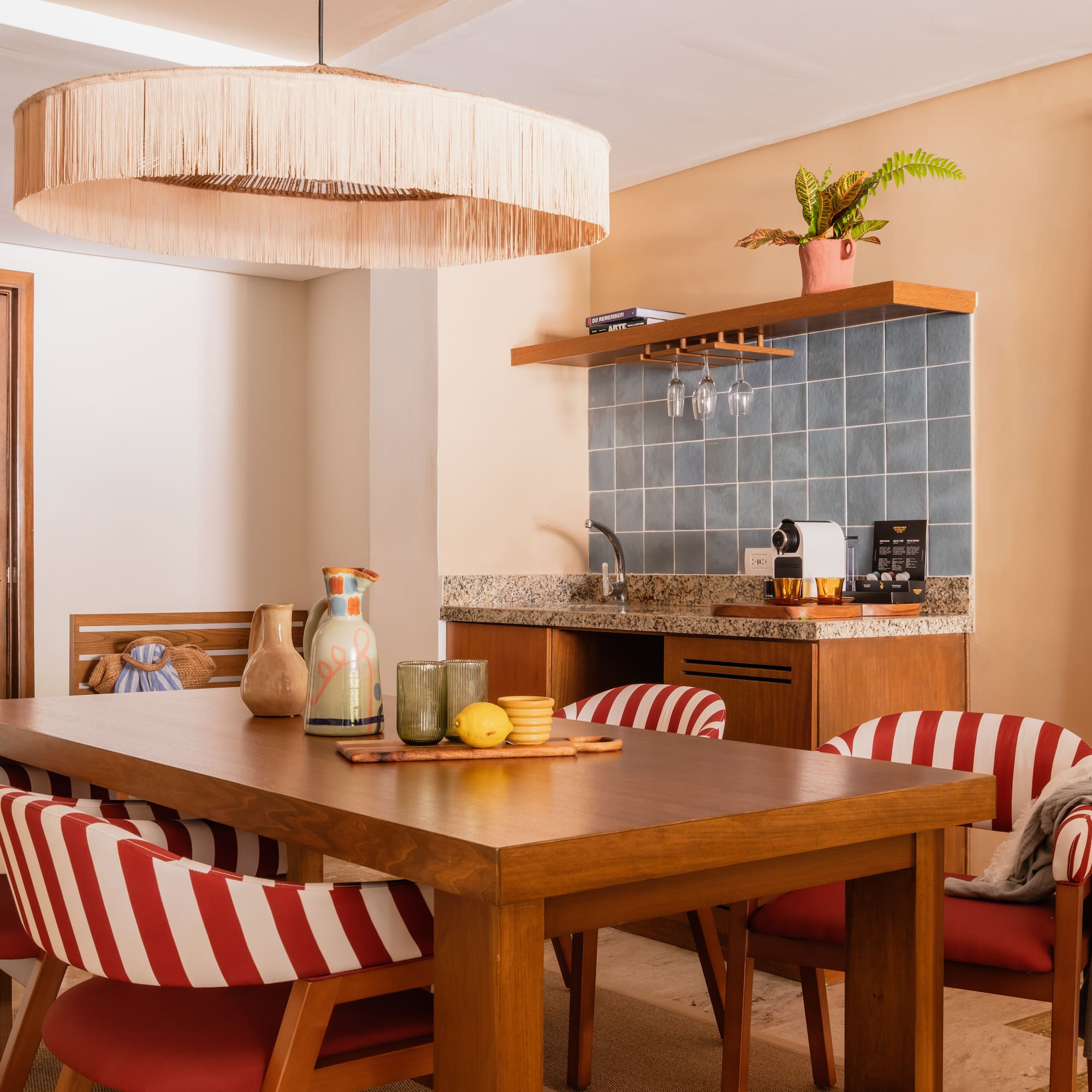 a dining table with chairs in a room