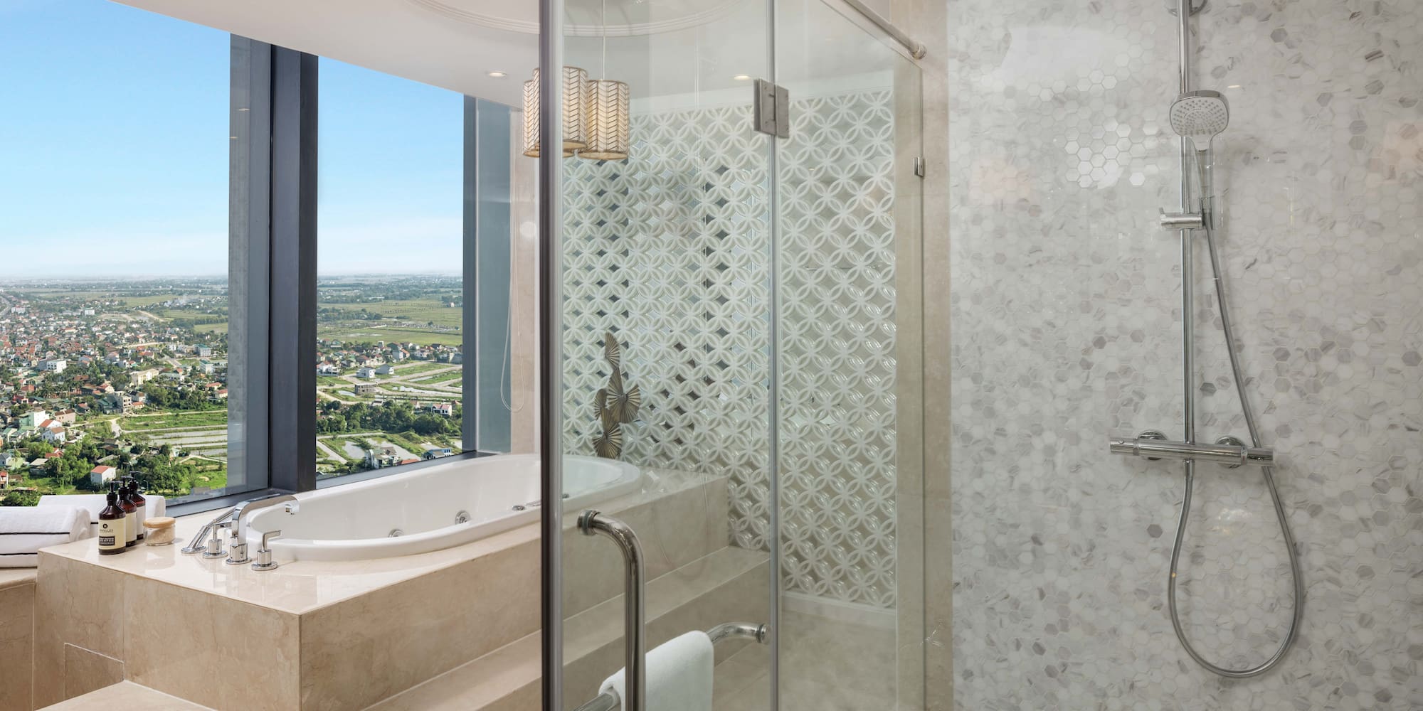 a bathroom with a bathtub and shower
