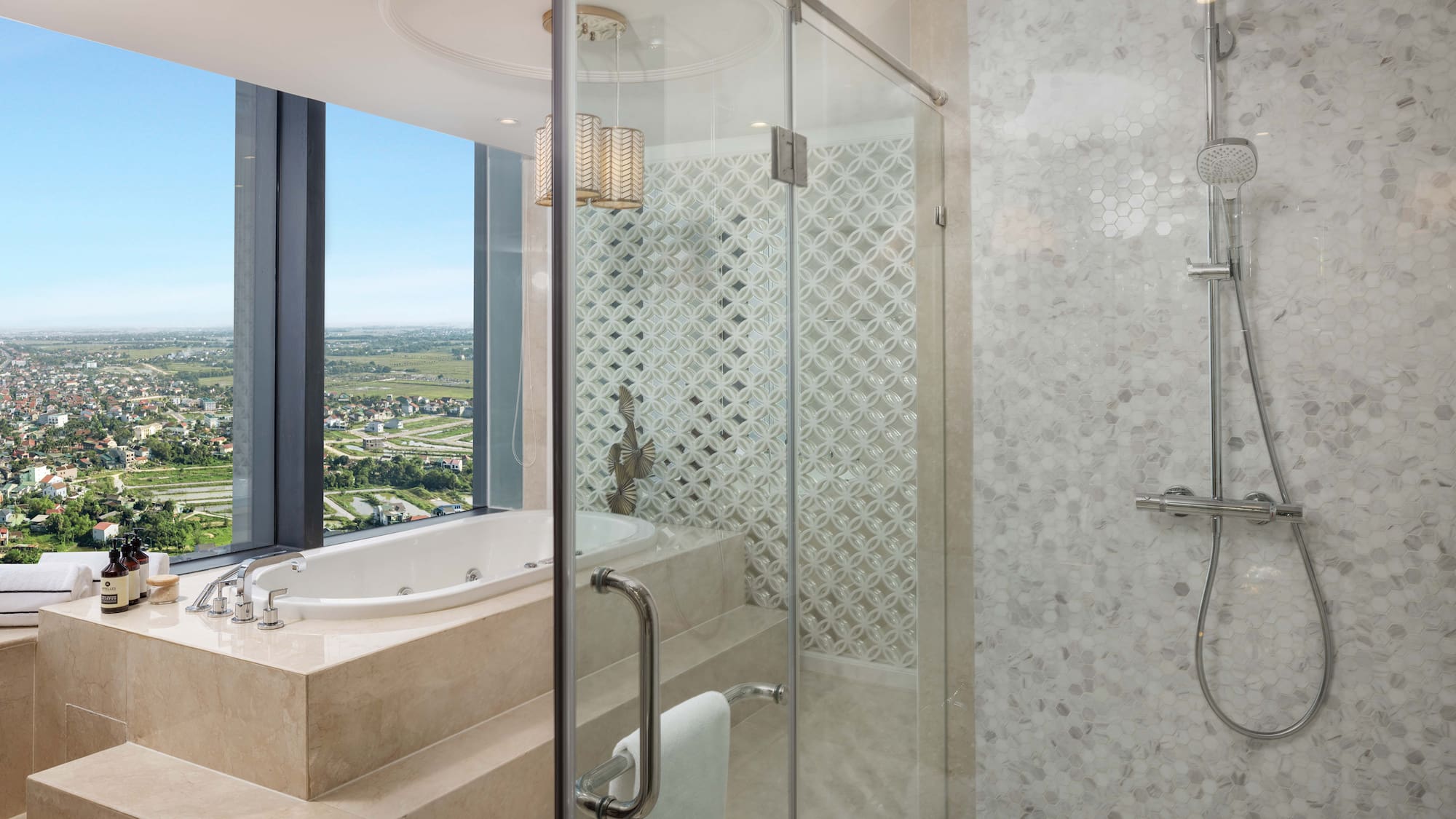 a bathroom with a bathtub and shower