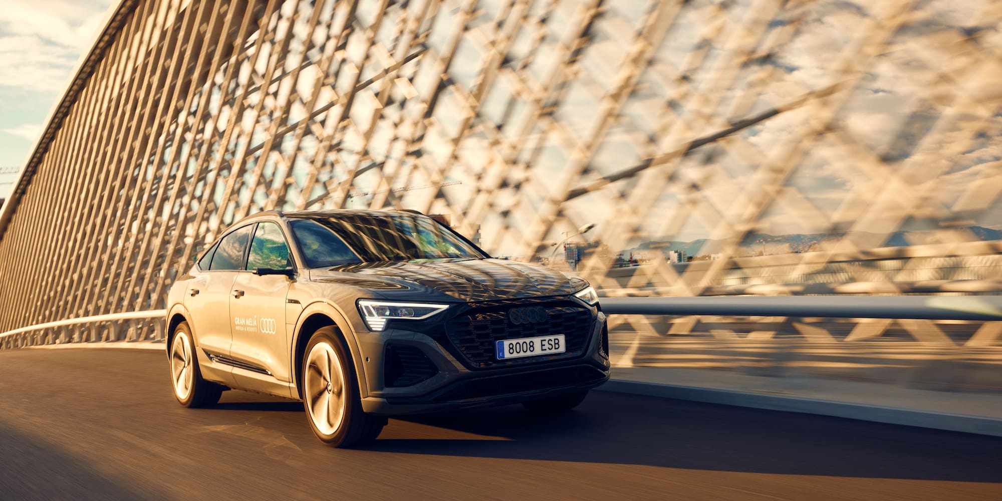 a car driving on a bridge