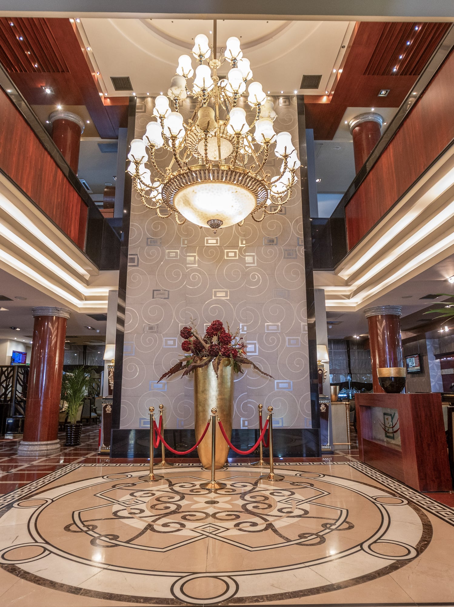 a large chandelier in a hotel lobby