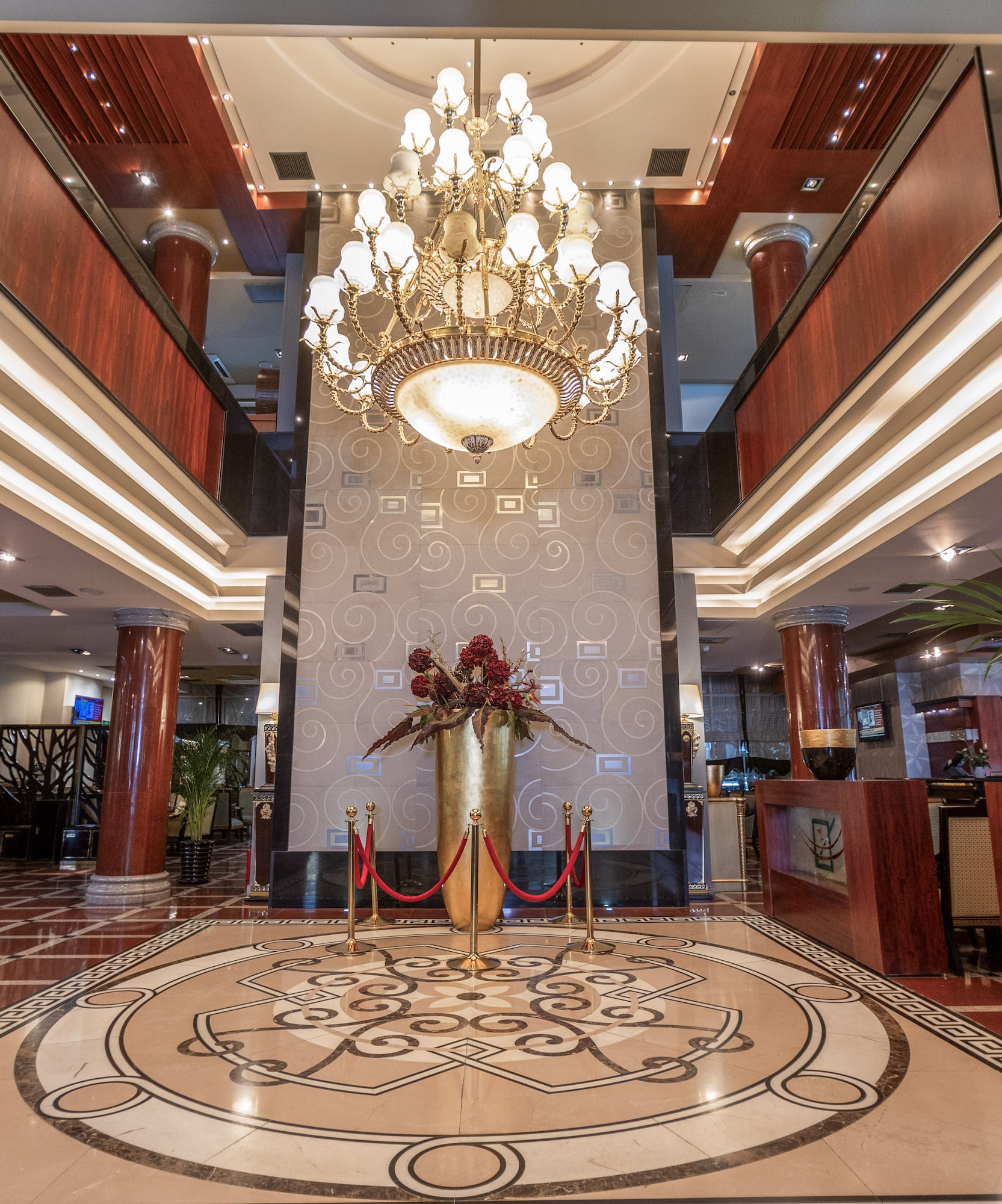 a large chandelier in a hotel lobby