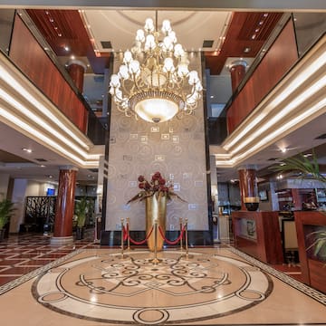 a large chandelier in a hotel lobby