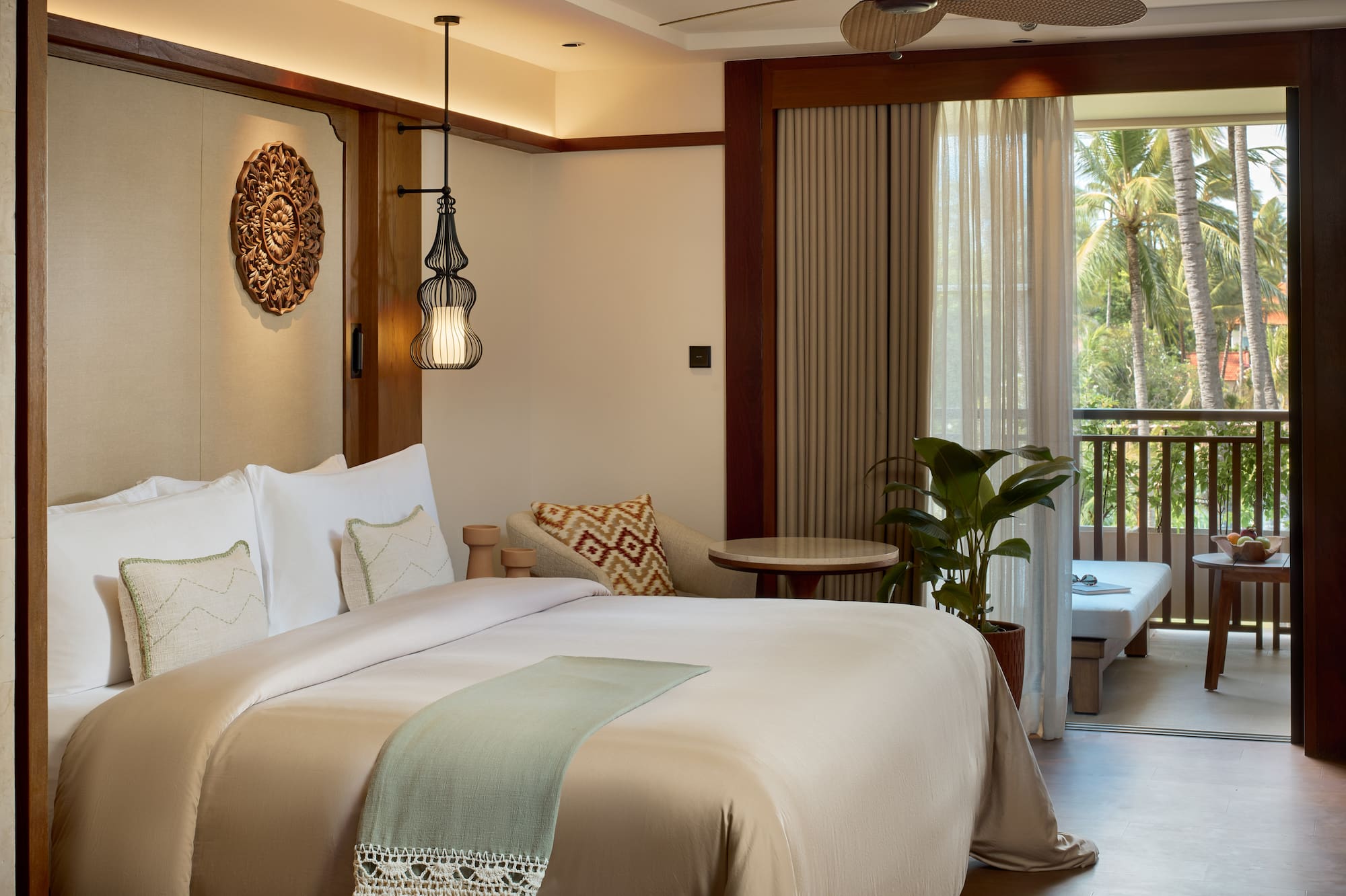 a bedroom with a bed and a tub