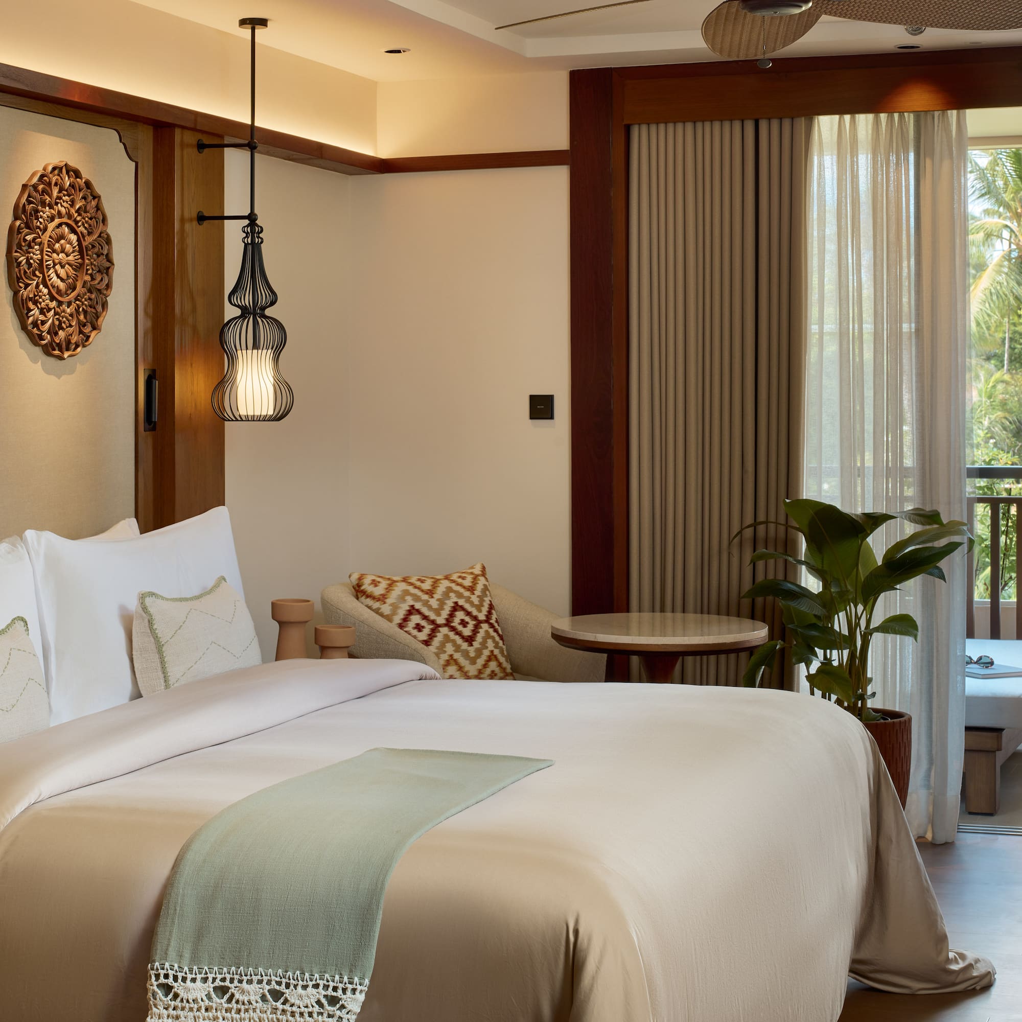 a bedroom with a bed and a tub