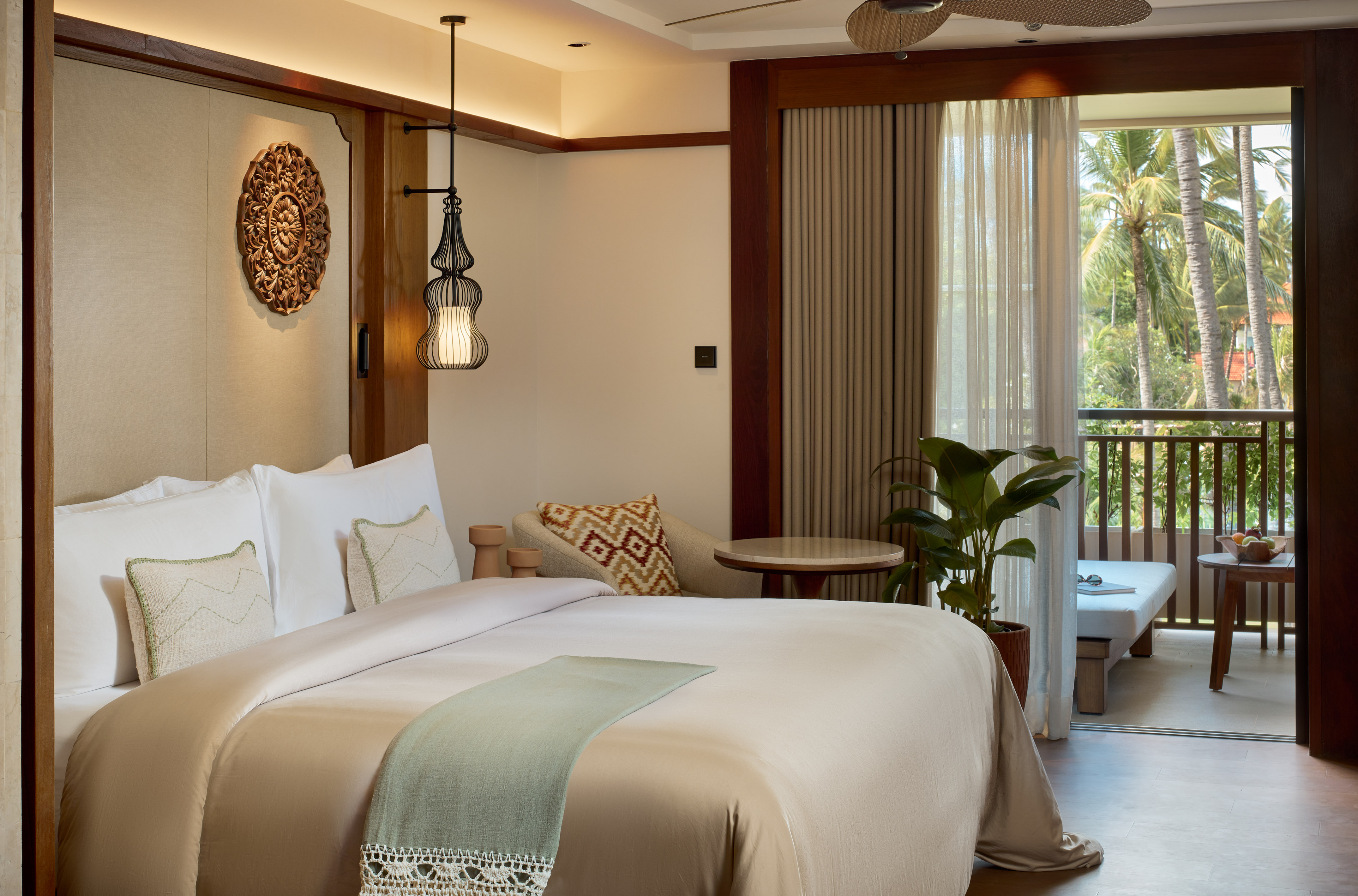 a bedroom with a bed and a tub