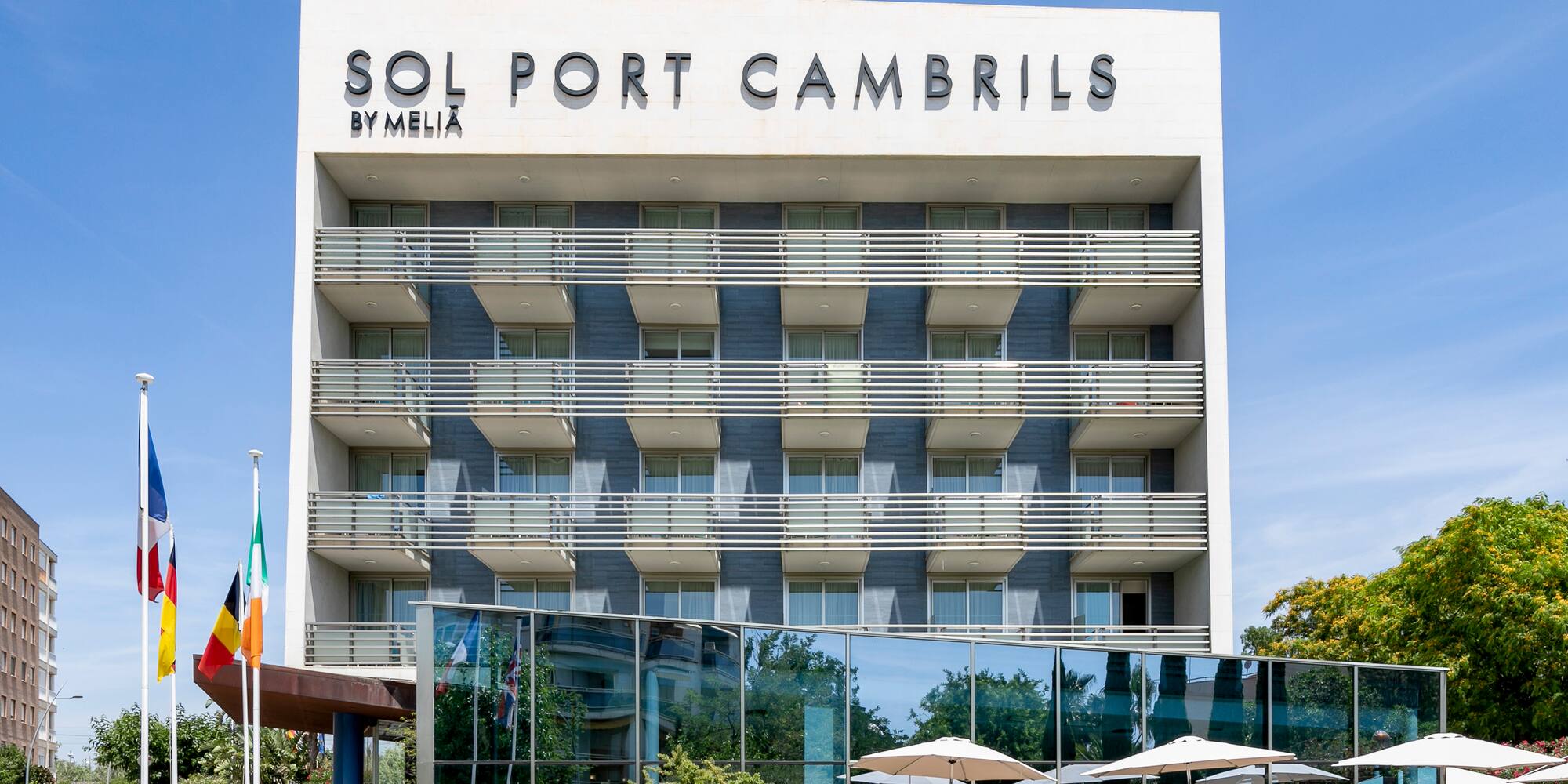 a building with flags in front of it