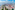 a city with many buildings and a body of water