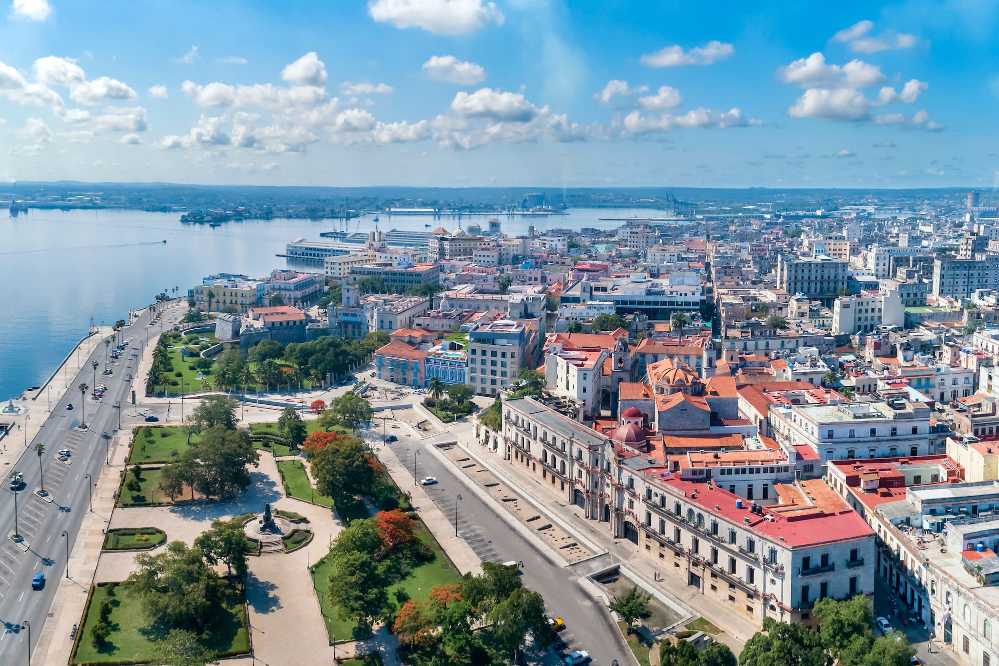 a city with many buildings and a body of water