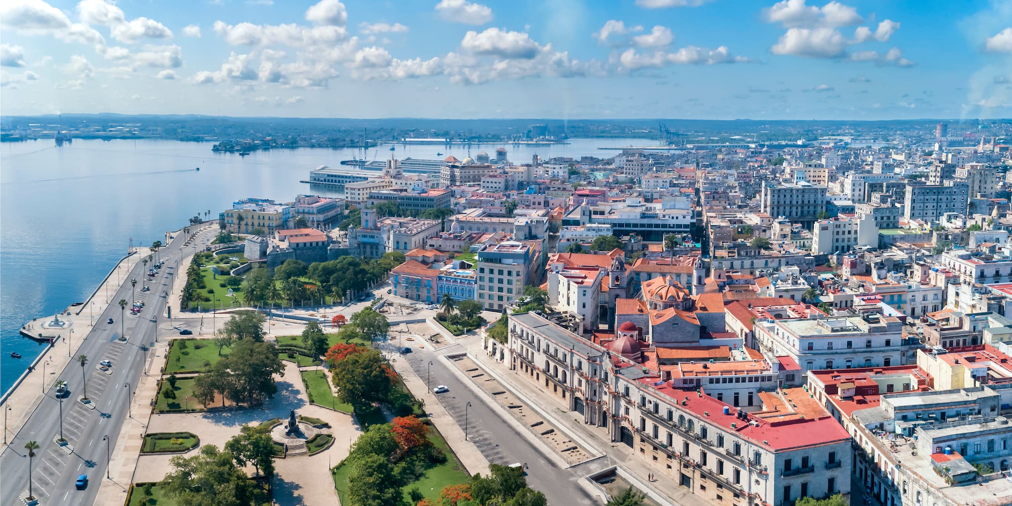 a city with many buildings and a body of water