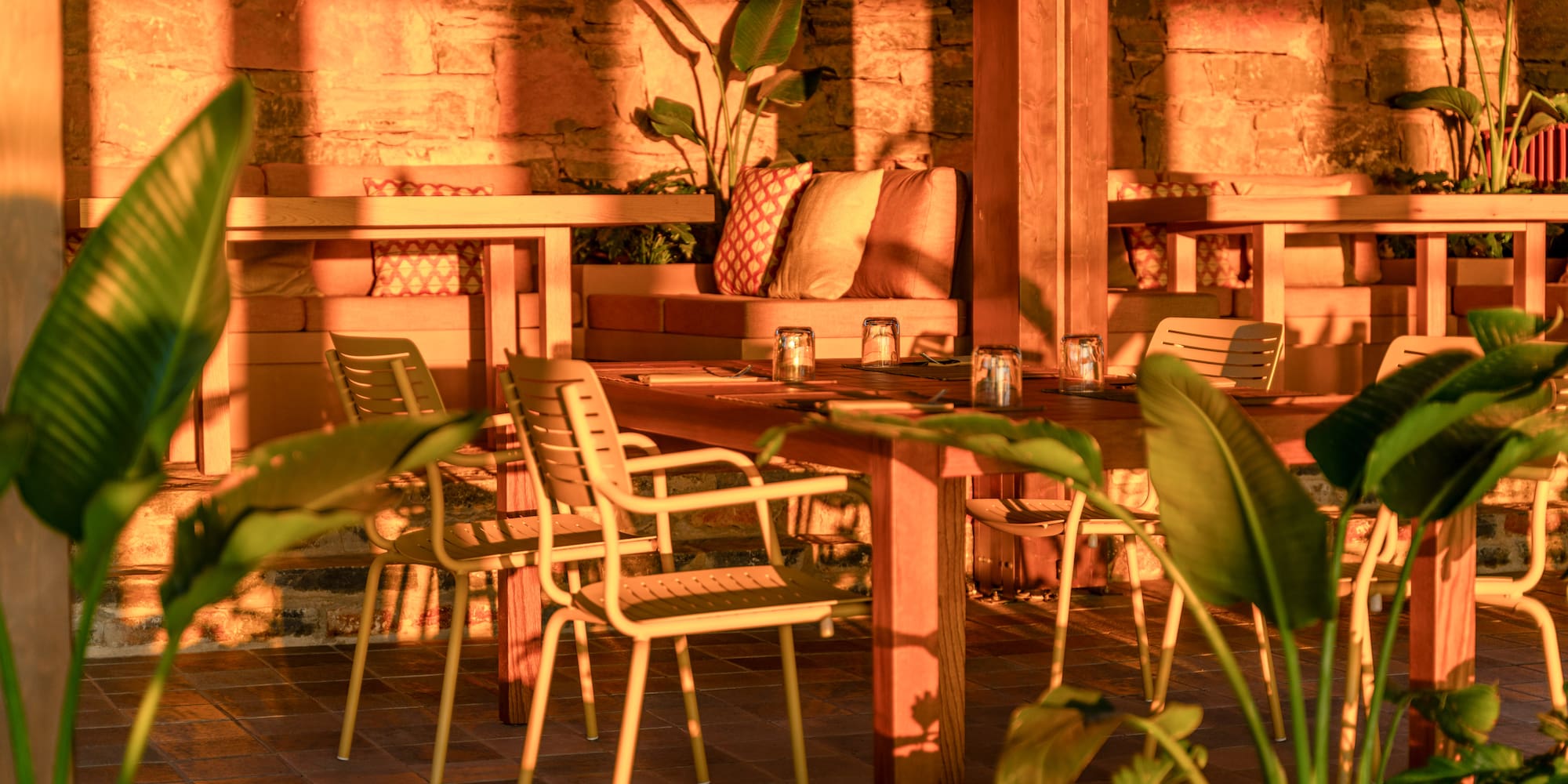 a table and chairs in a patio