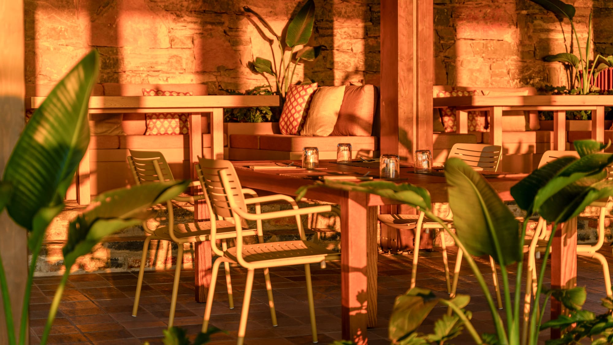 a table and chairs in a patio