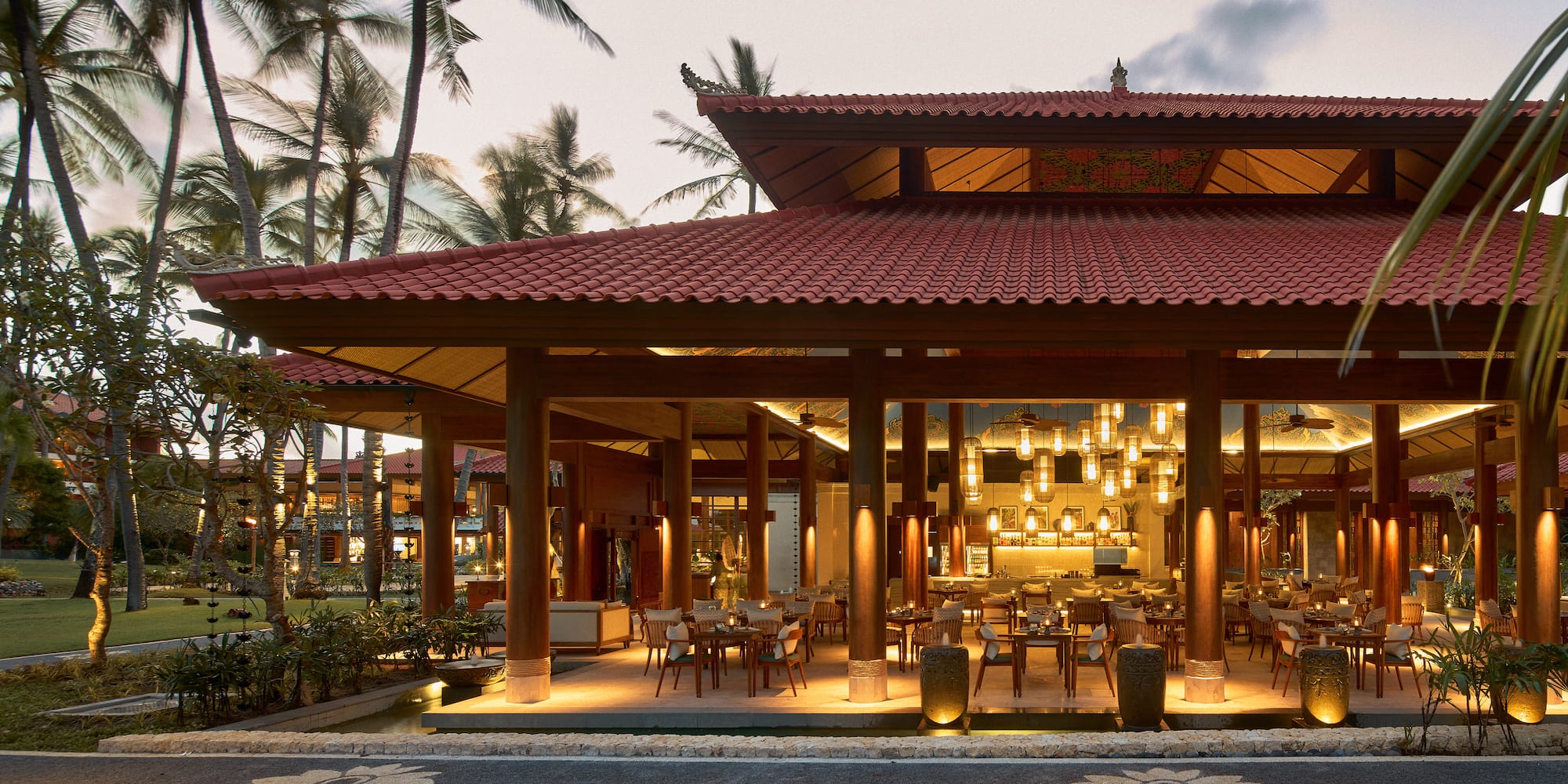 a restaurant with a red roof and a red tile roof