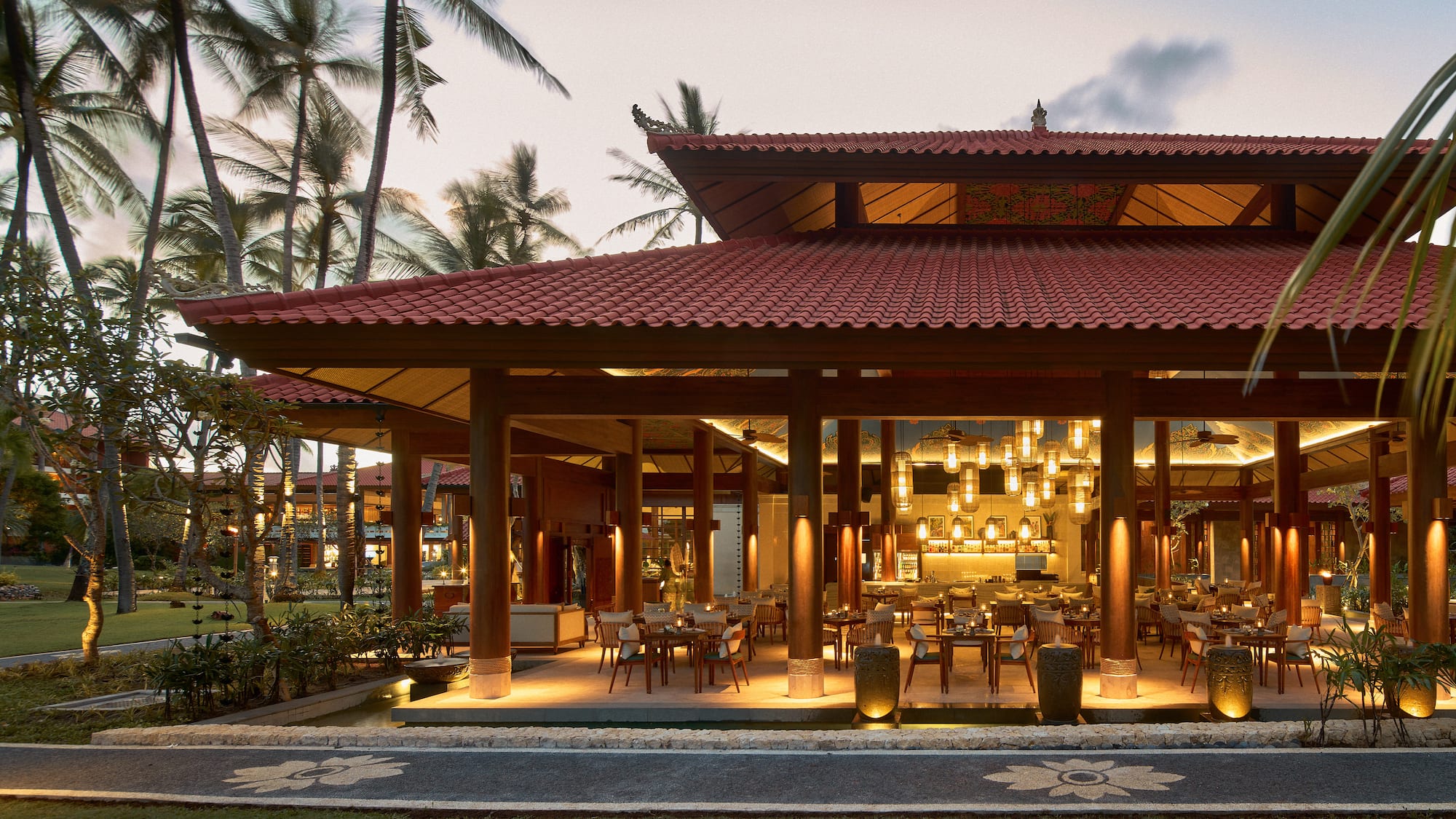 a restaurant with a red roof and a red tile roof