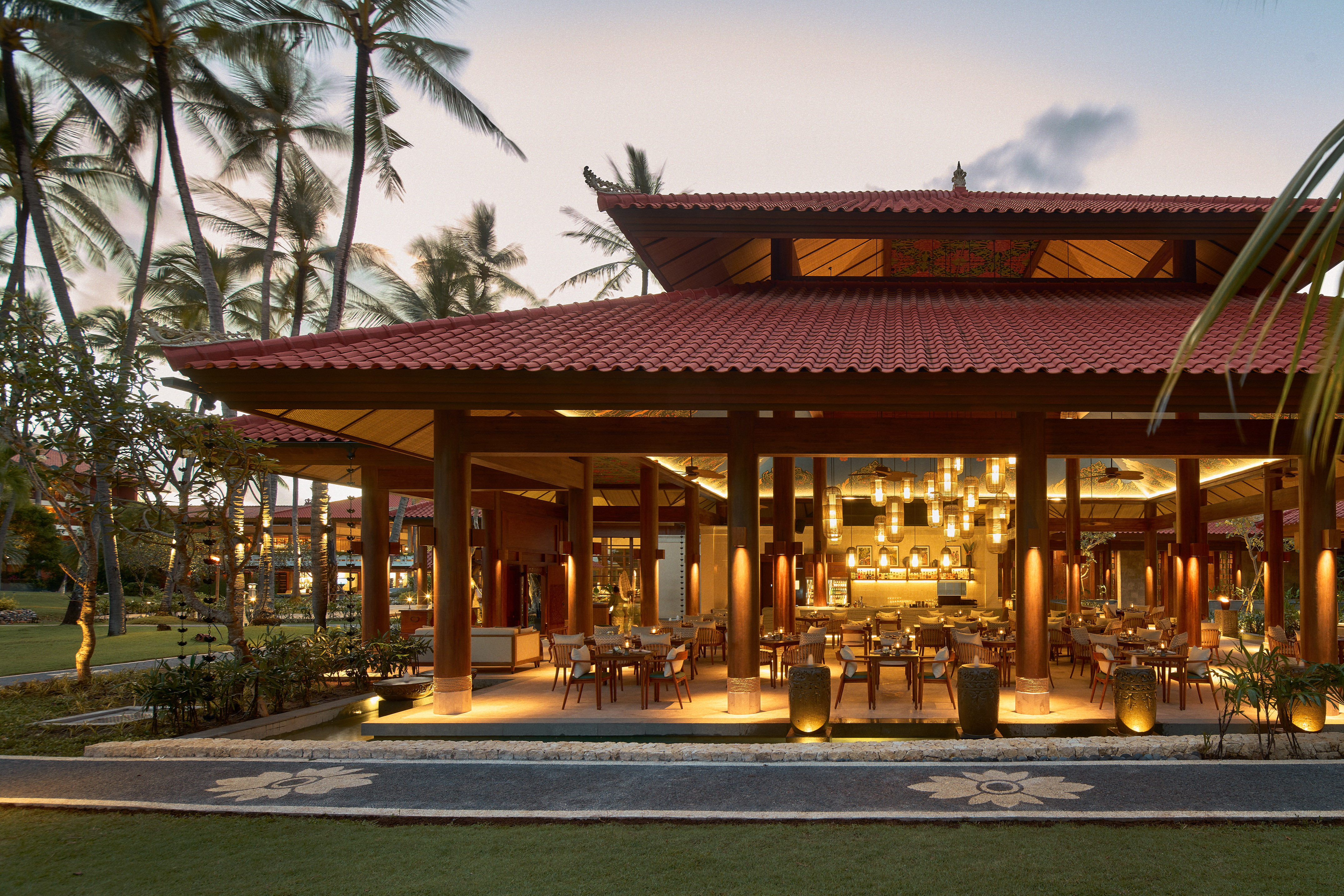 a restaurant with a red roof and a red tile roof