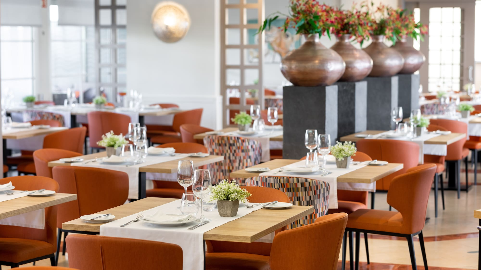 a restaurant with tables and chairs