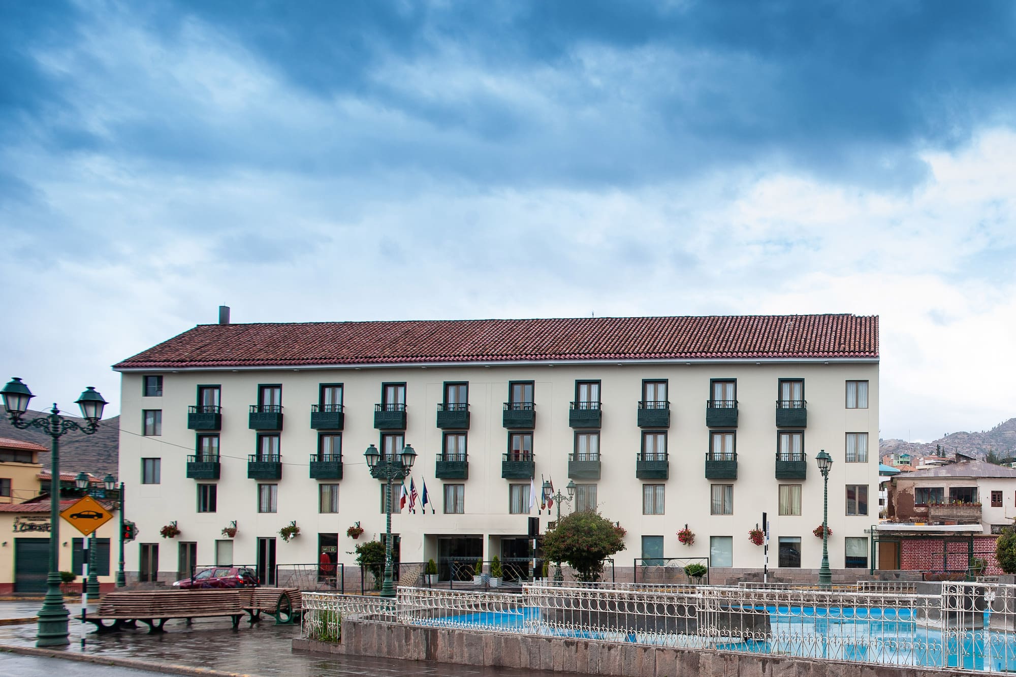 a building with a pool in front of it
