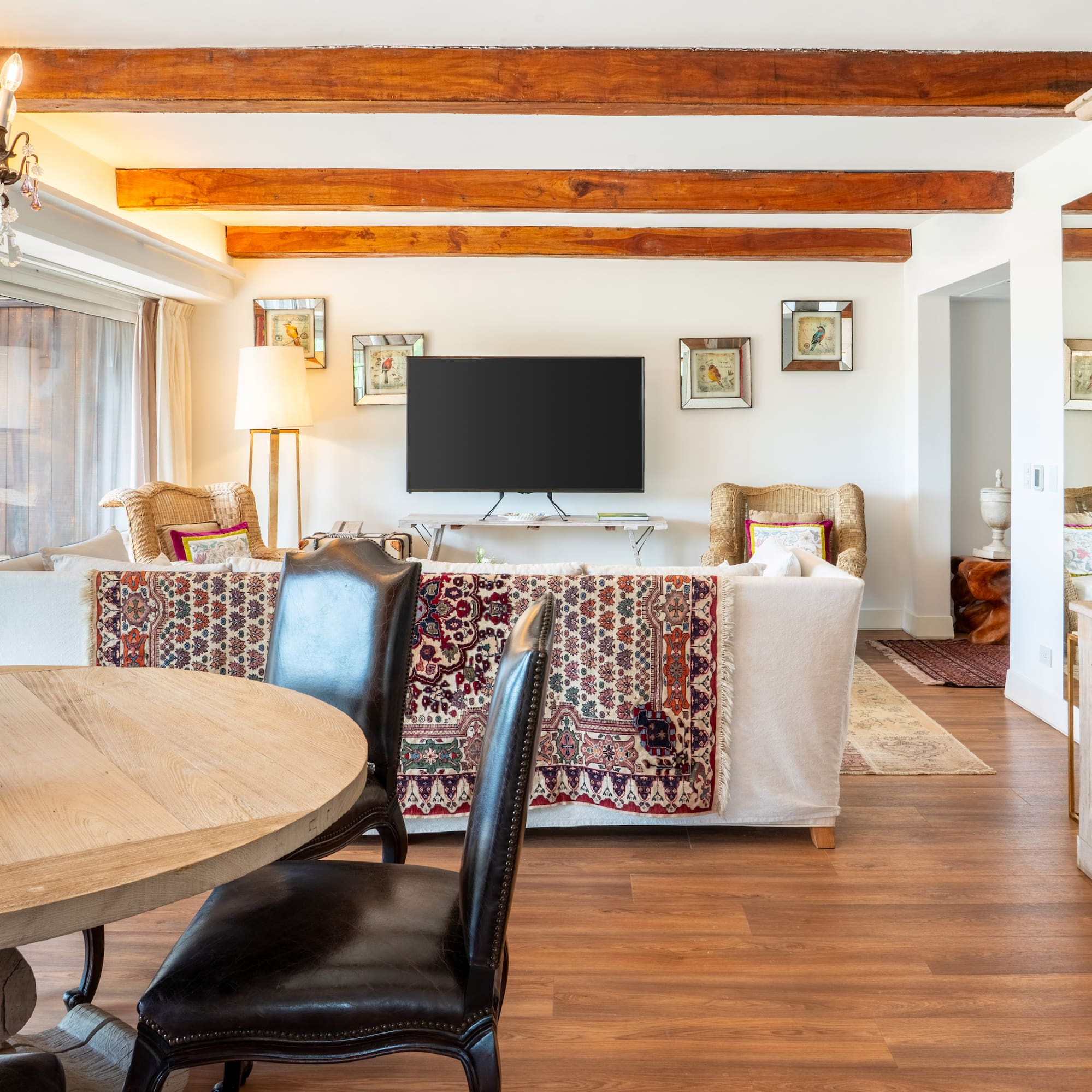 a living room with a television and a couch