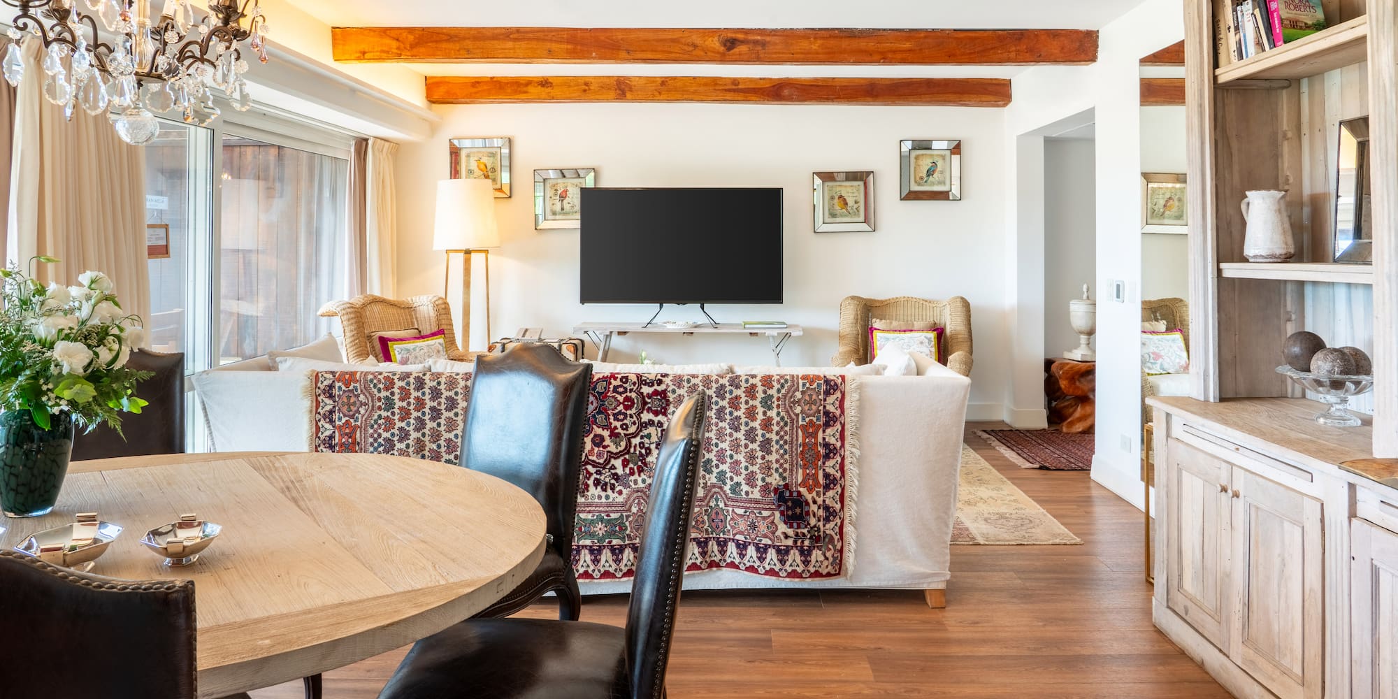 a living room with a television and a couch