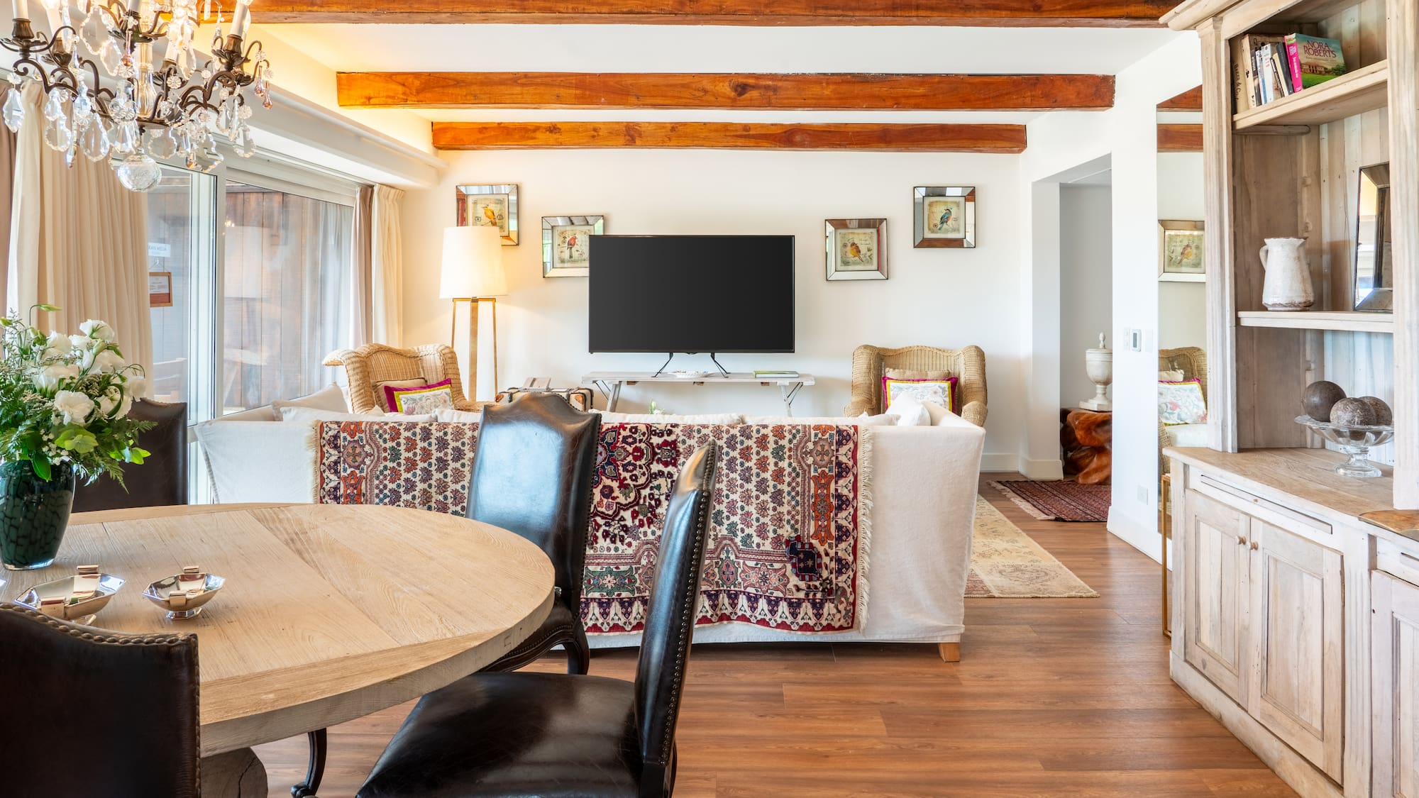 a living room with a television and a couch