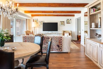 a living room with a television and a couch