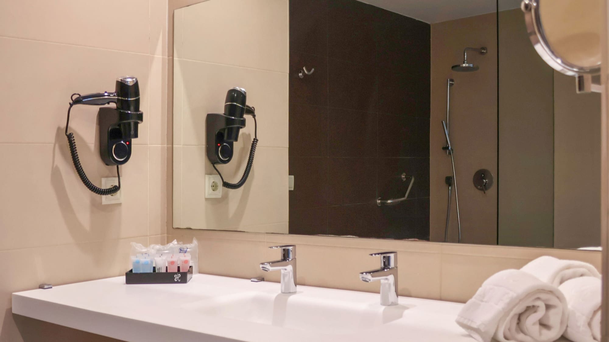 a bathroom with a mirror and sink