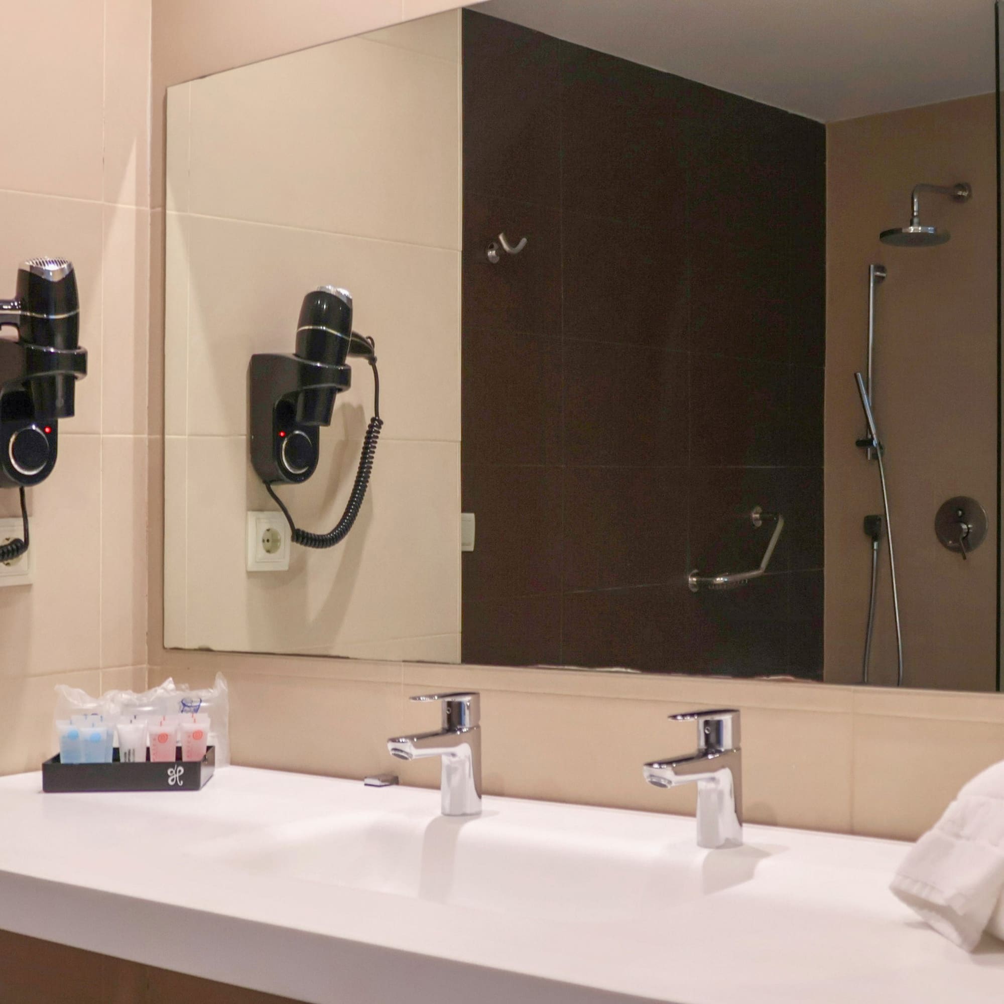 a bathroom with a mirror and sink