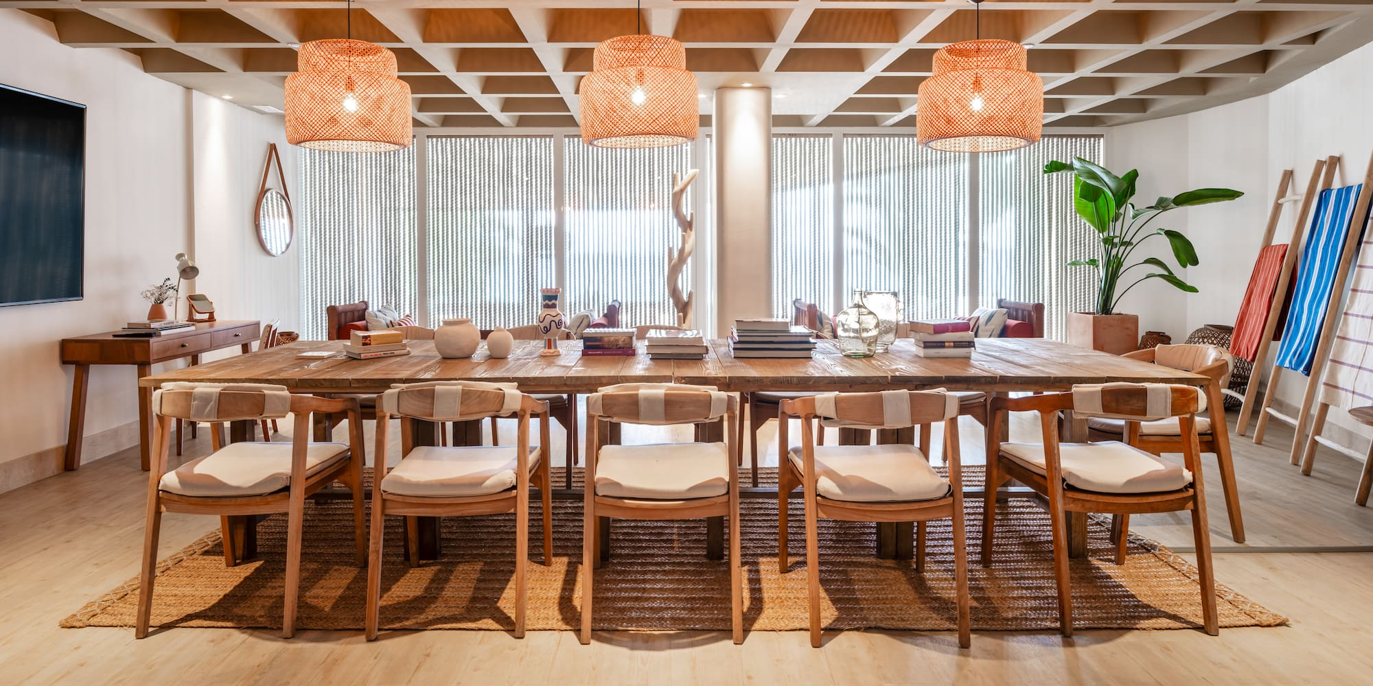 a table with chairs and lamps