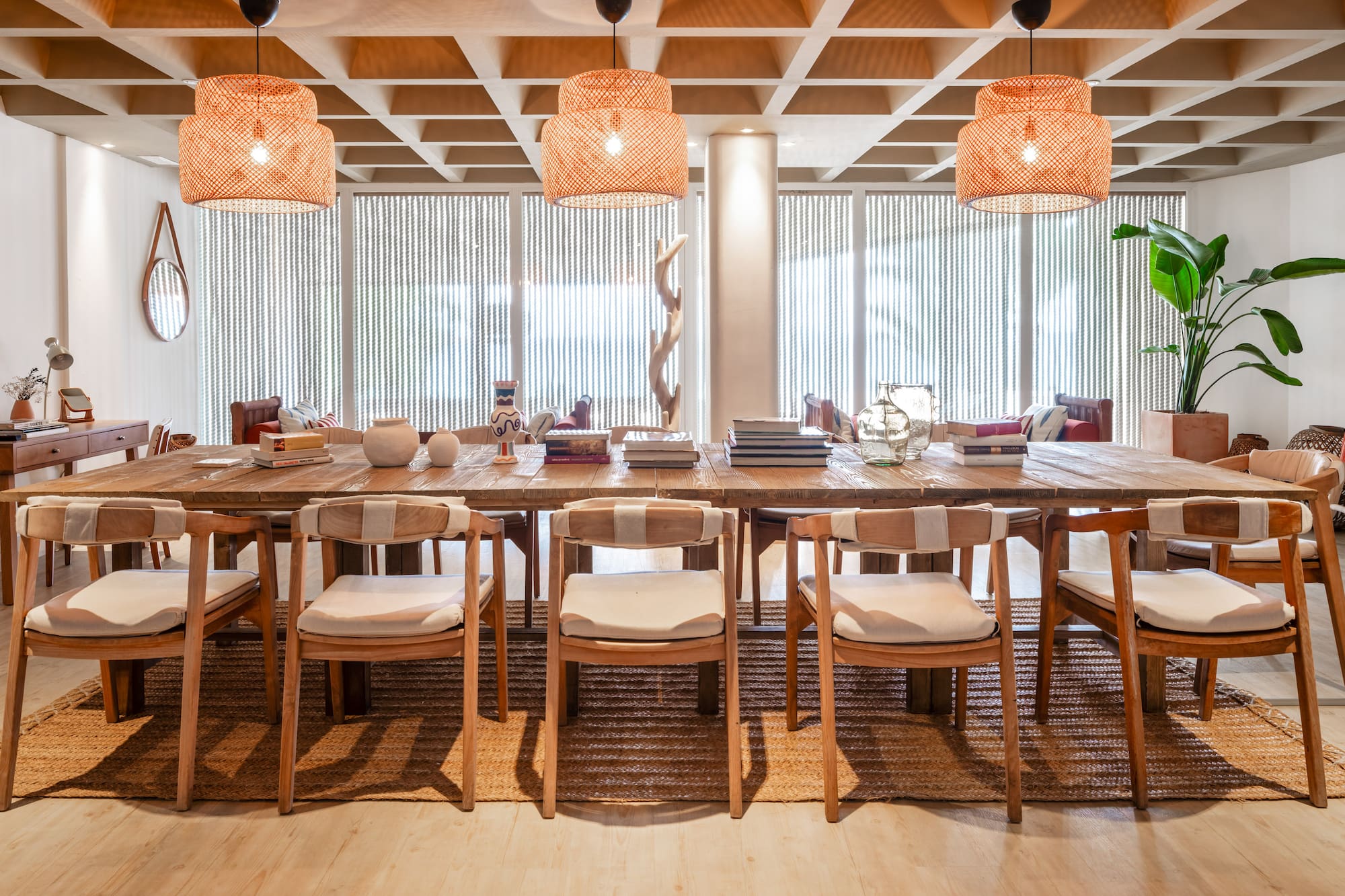 a table with chairs and lamps