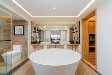a large white tub in a bathroom