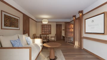 a living room with a couch and a table