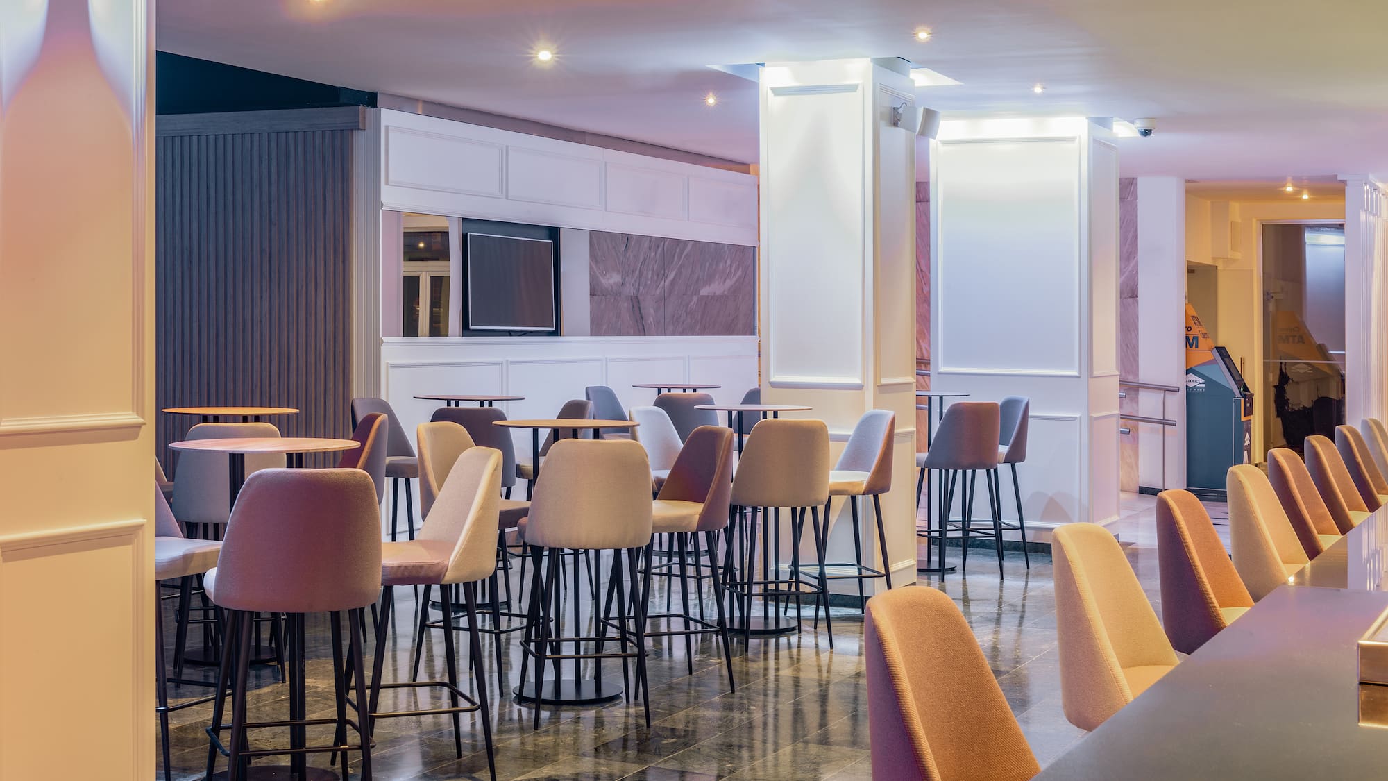 a room with tables and chairs