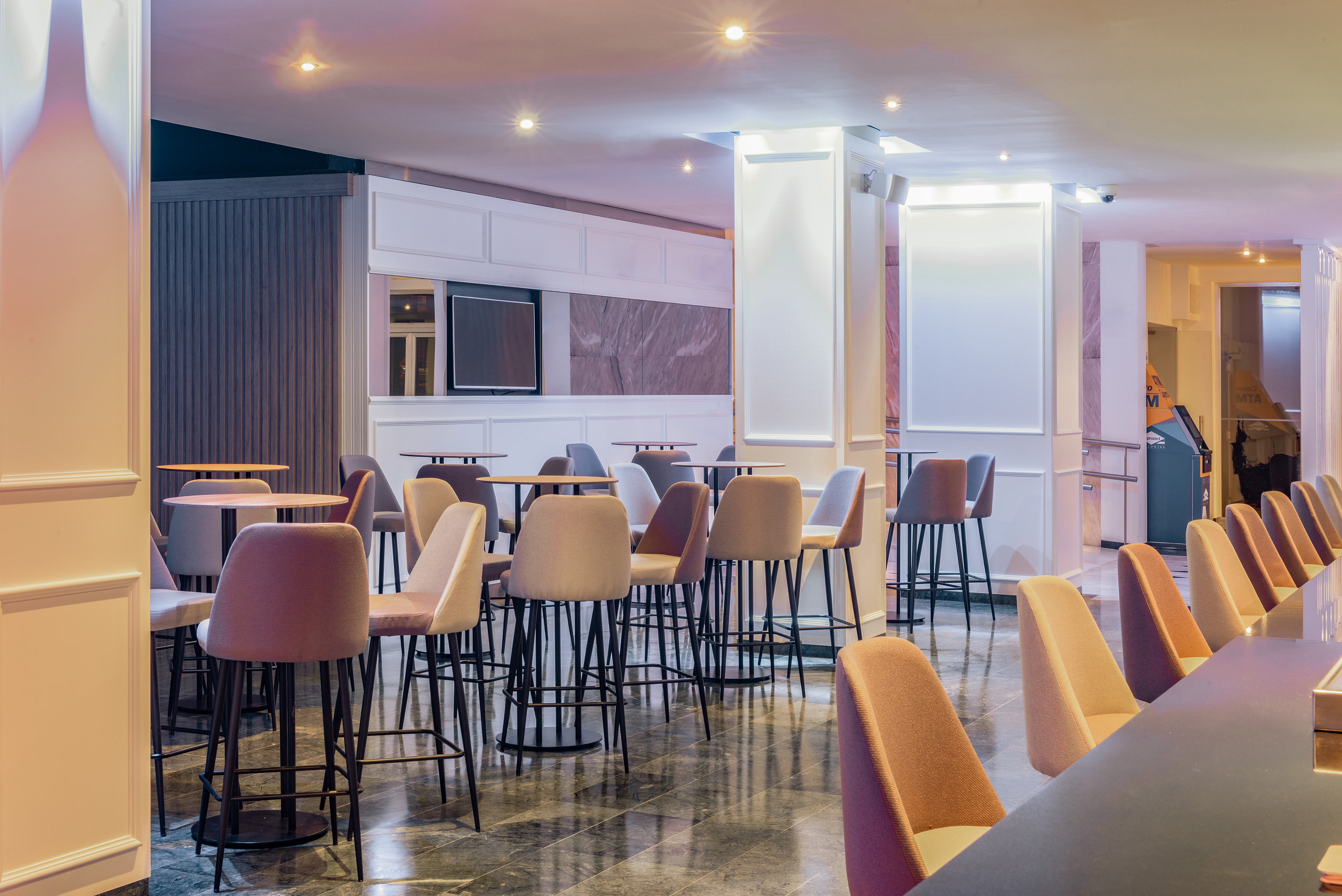 a room with tables and chairs