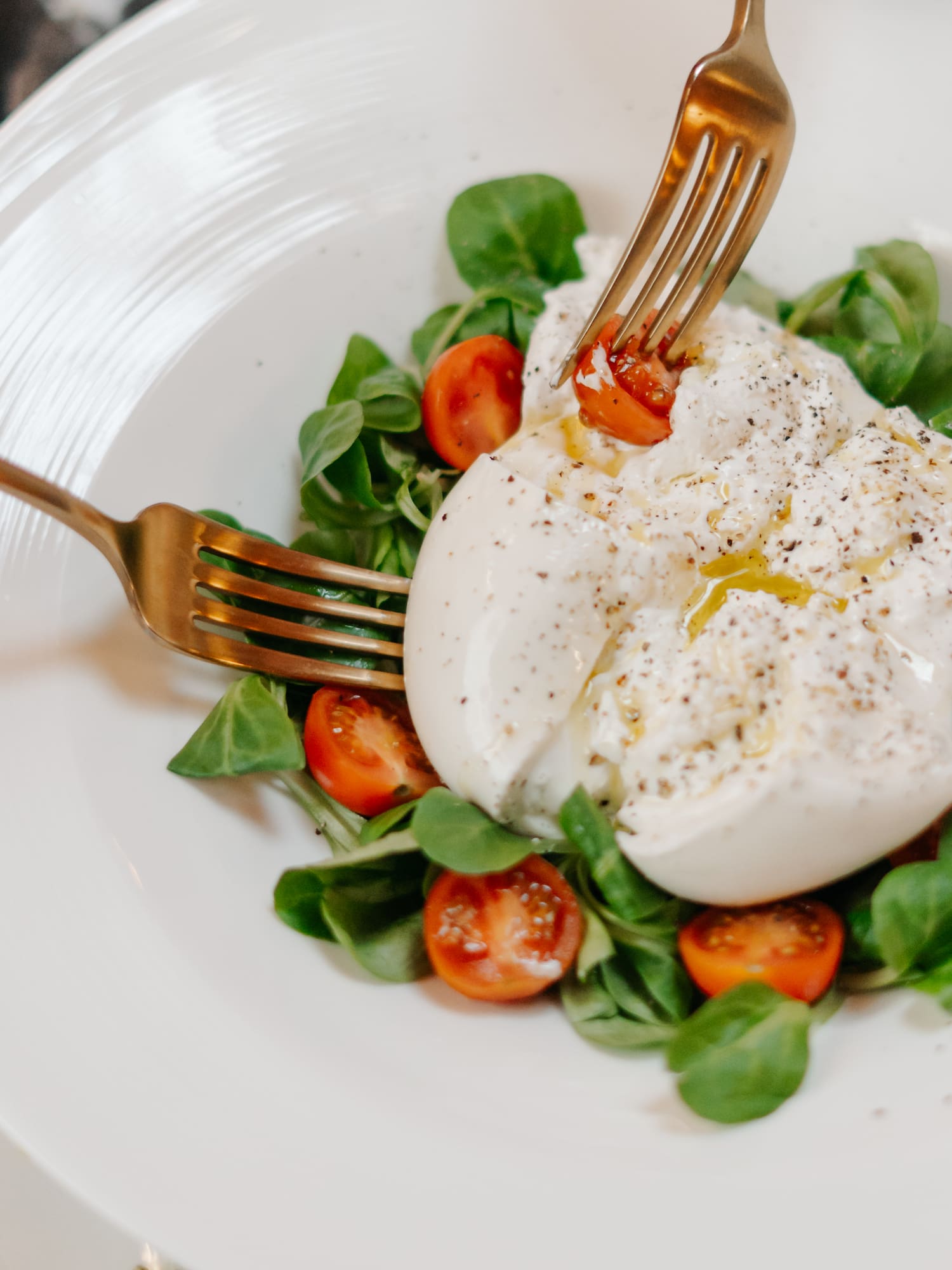 a plate of food with fork and knife