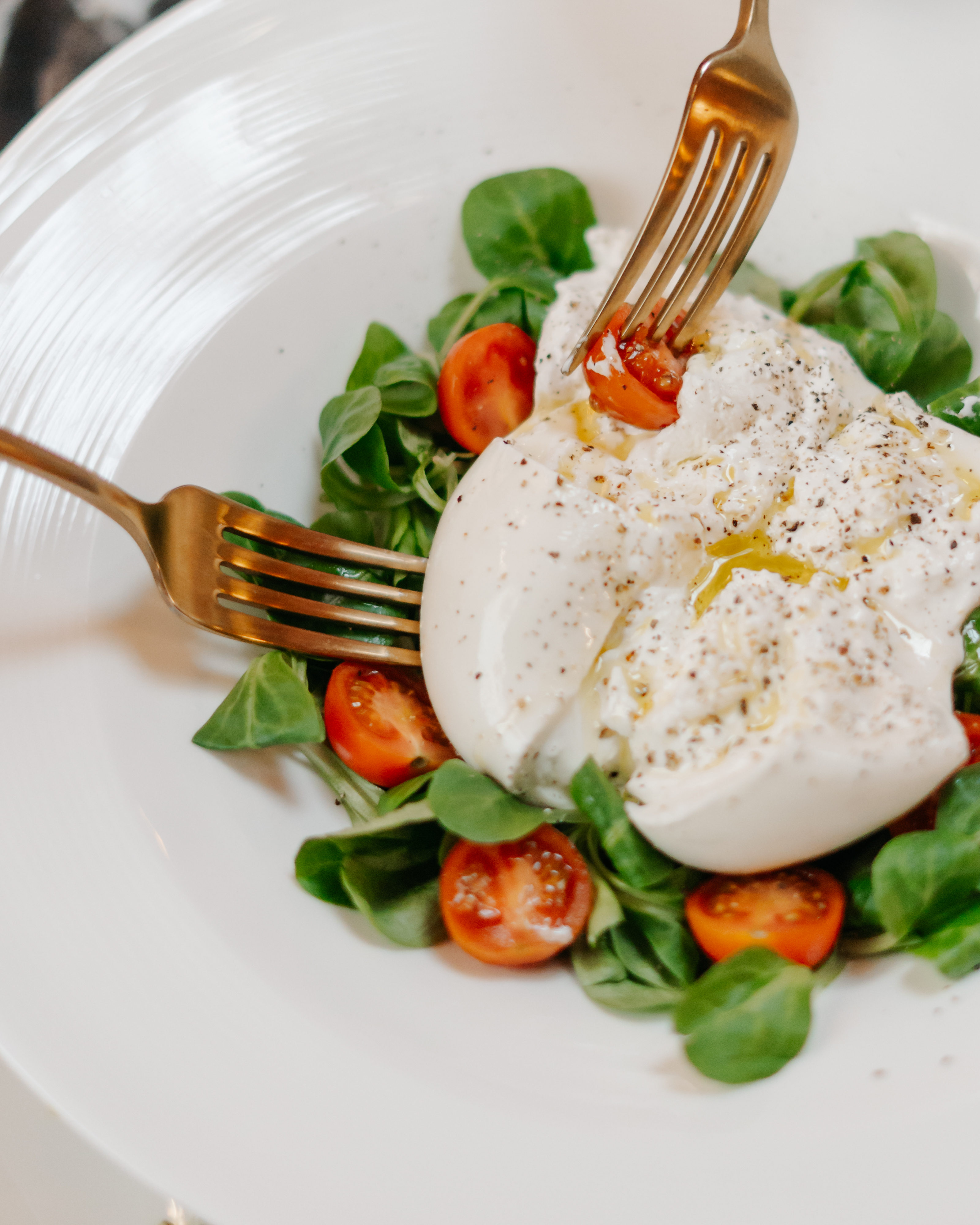 a plate of food with fork and knife