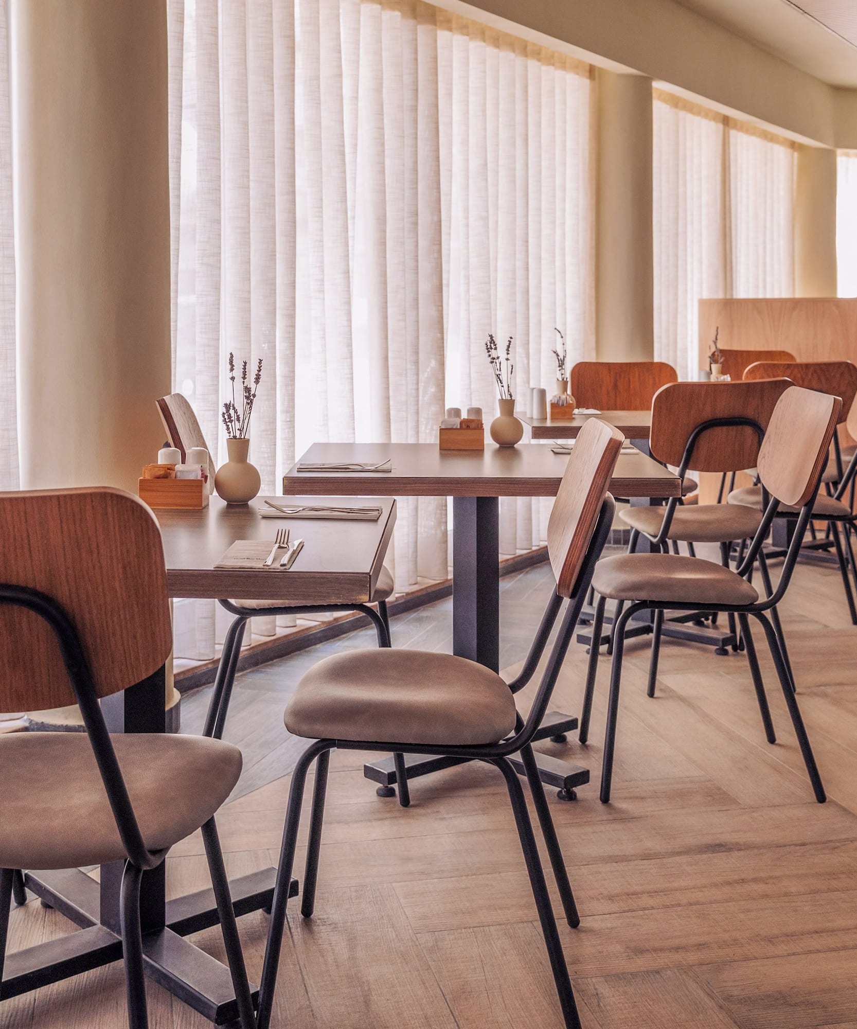 a room with tables and chairs