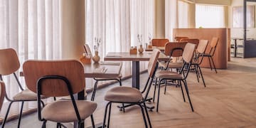 a room with tables and chairs