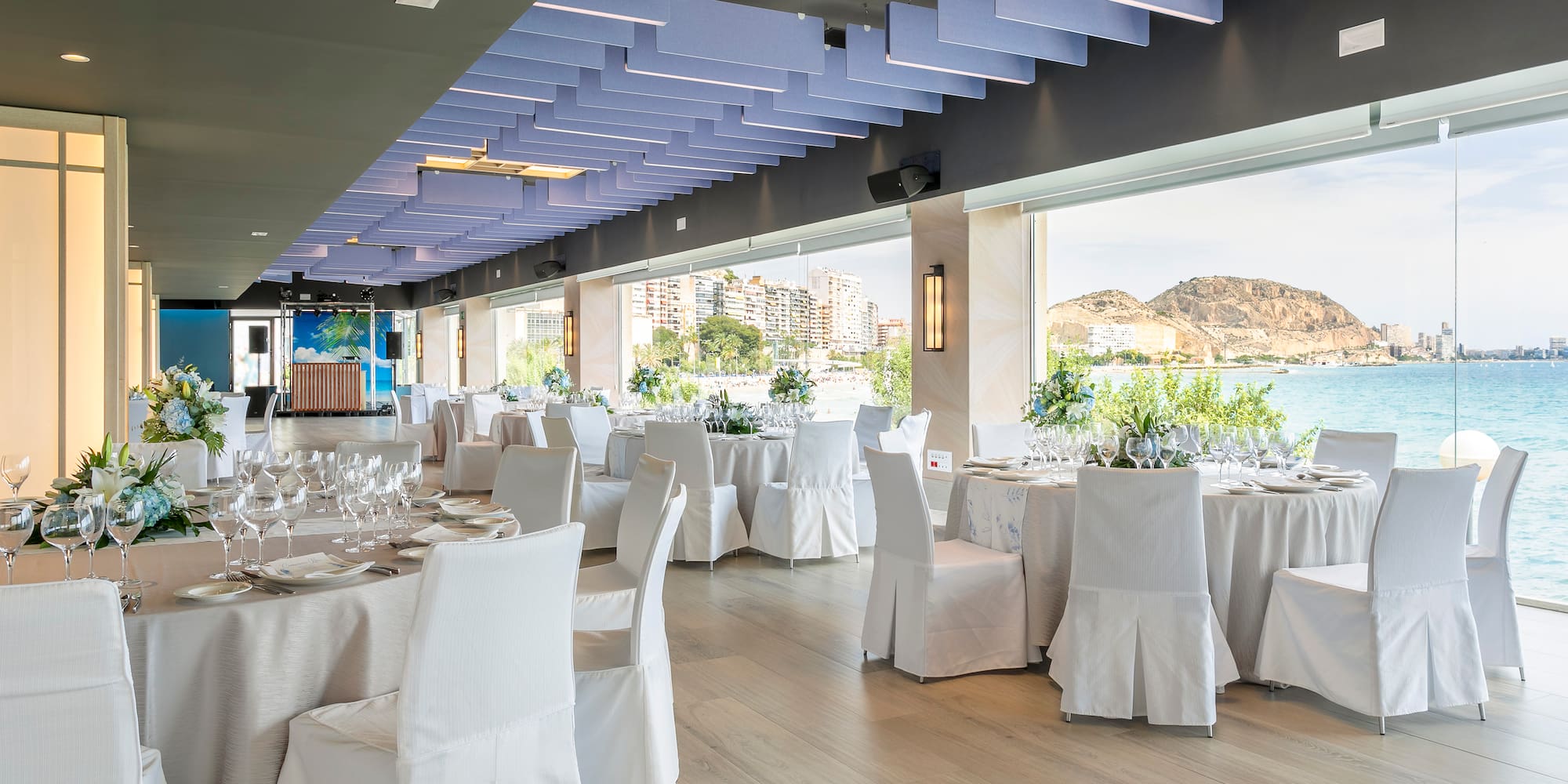 a room with tables and chairs