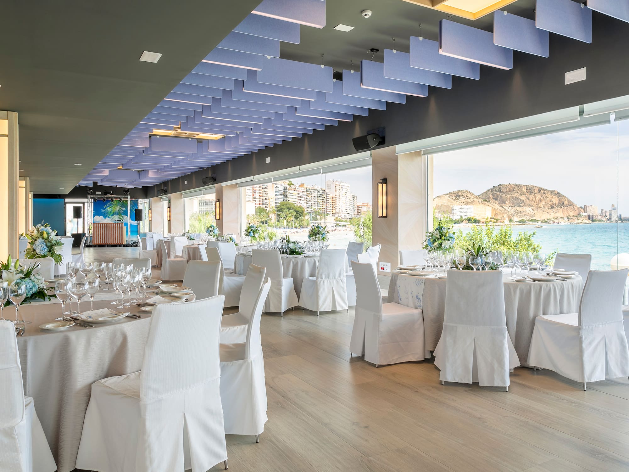 a room with tables and chairs