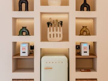 a shelf with shelves and objects on it