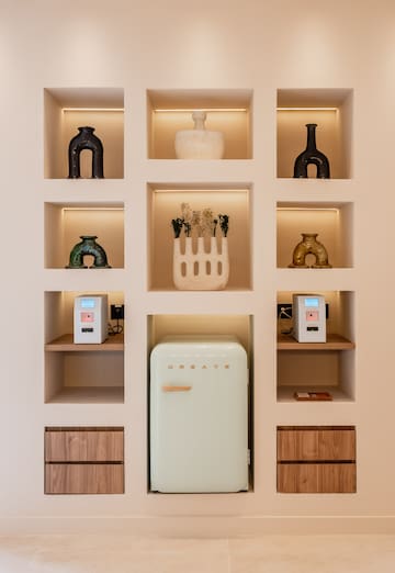 a shelf with shelves and objects on it