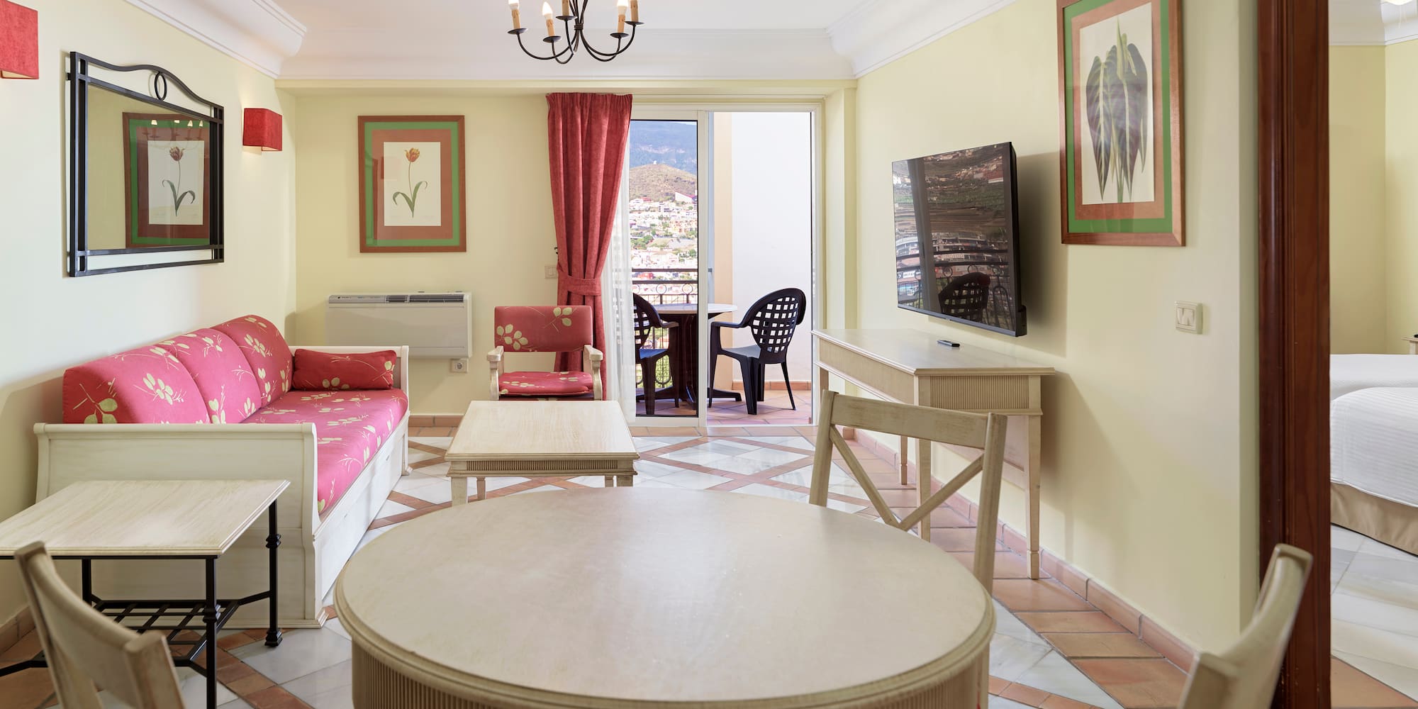 a room with a table and chairs