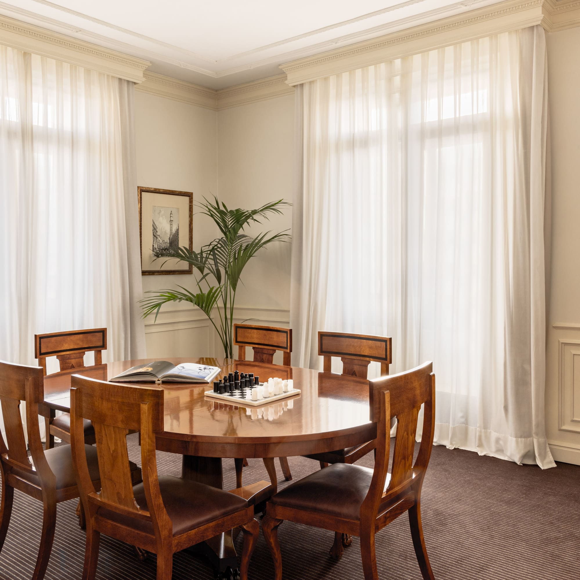 a room with a table and chairs