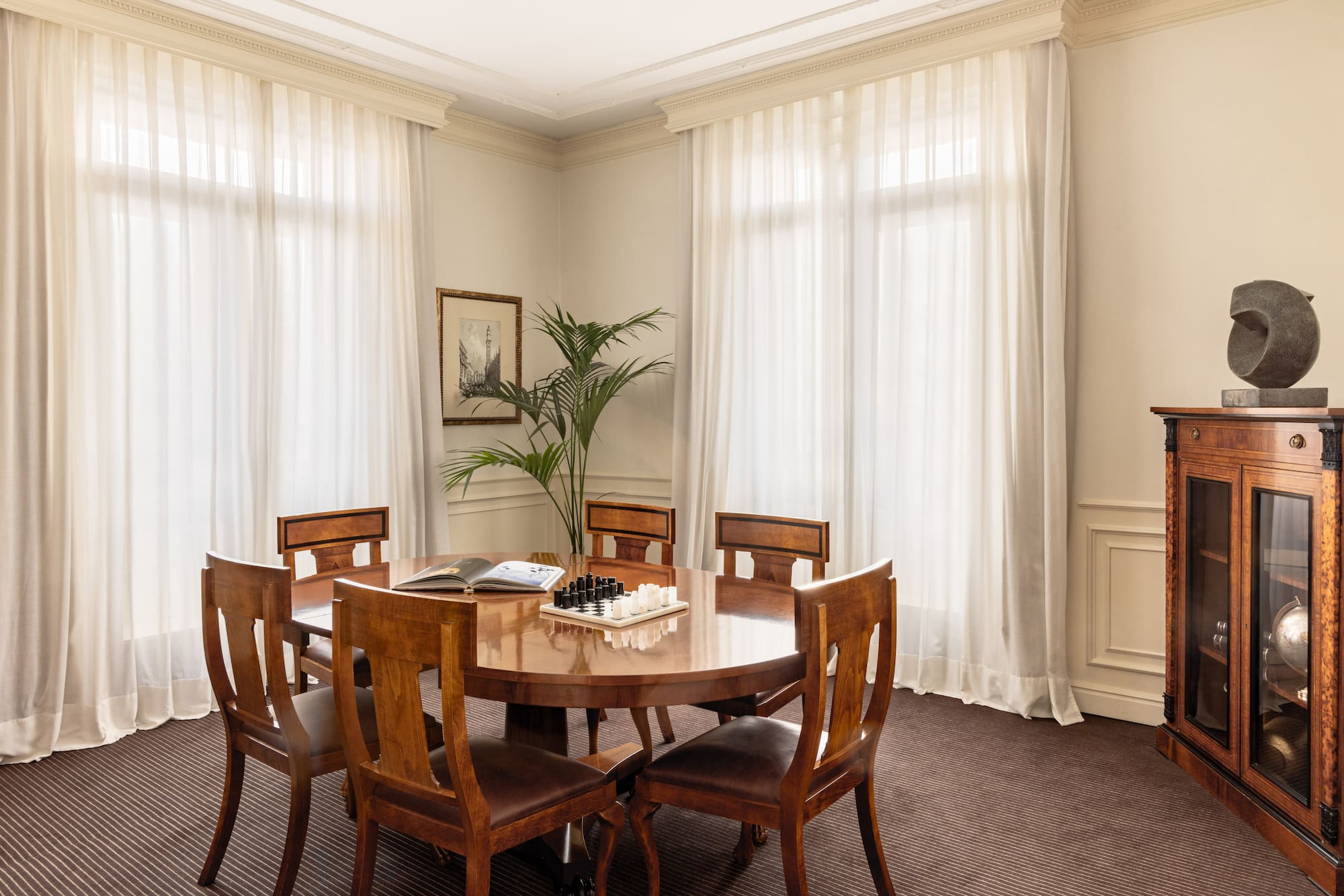 a room with a table and chairs