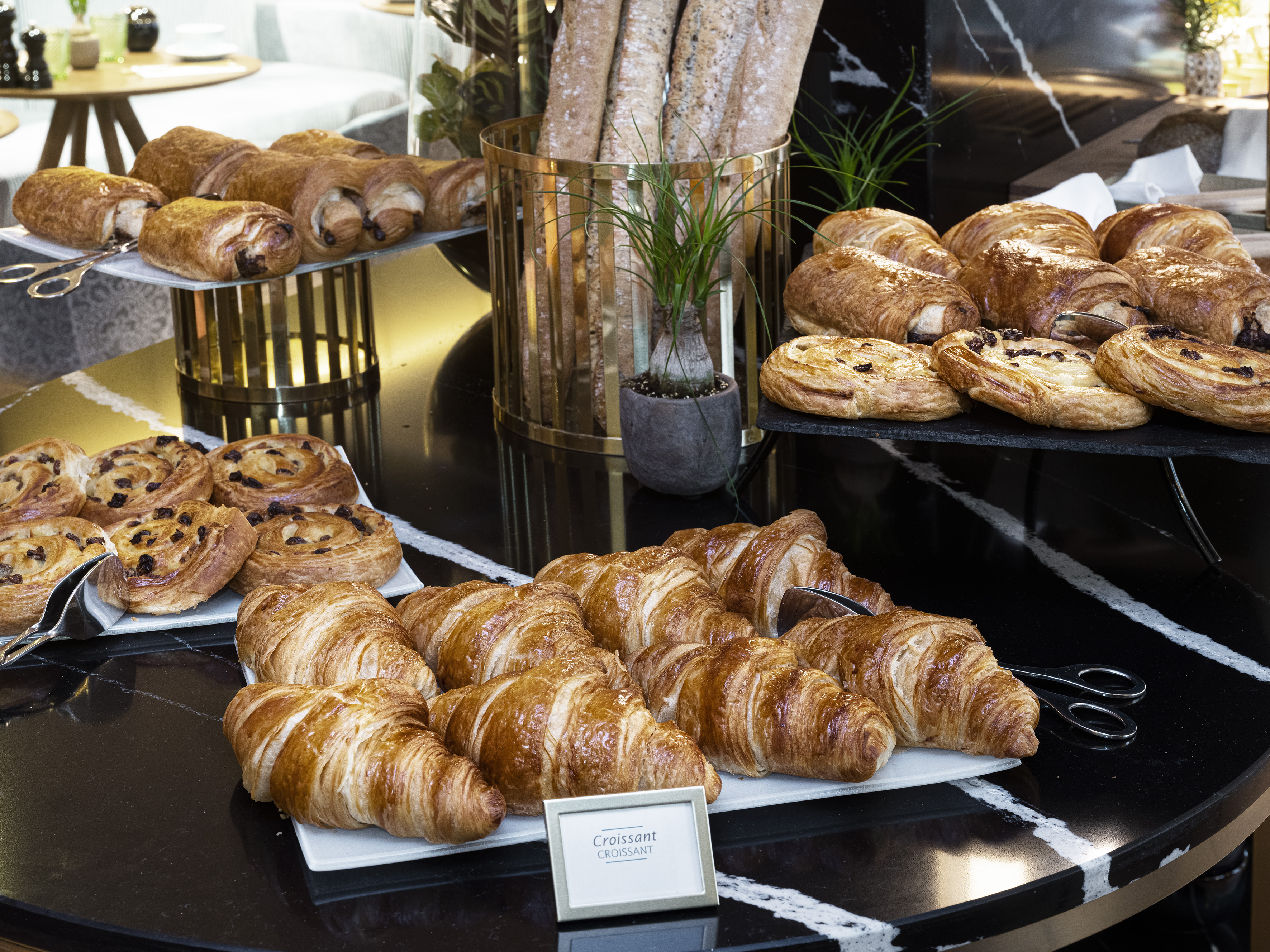 a table with pastries and bread