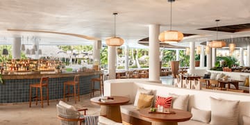 a room with tables and chairs